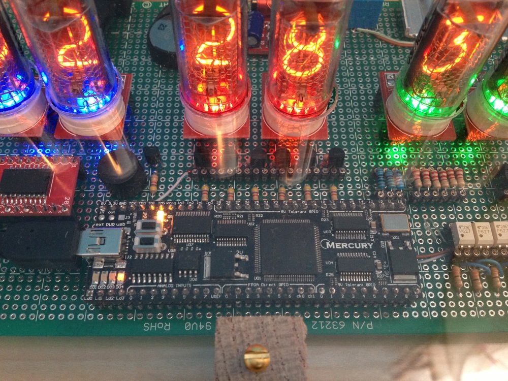 Close-up view showing the RTC, buzzer, Mercury FPGA module, LED driver transistors, and LED & tube series resistors.