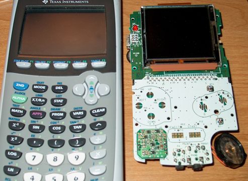 Size comparison of my TI-84 next to the GBC innards . I did not use the TI-84, but rather a broken TI-83 I got from a friend.