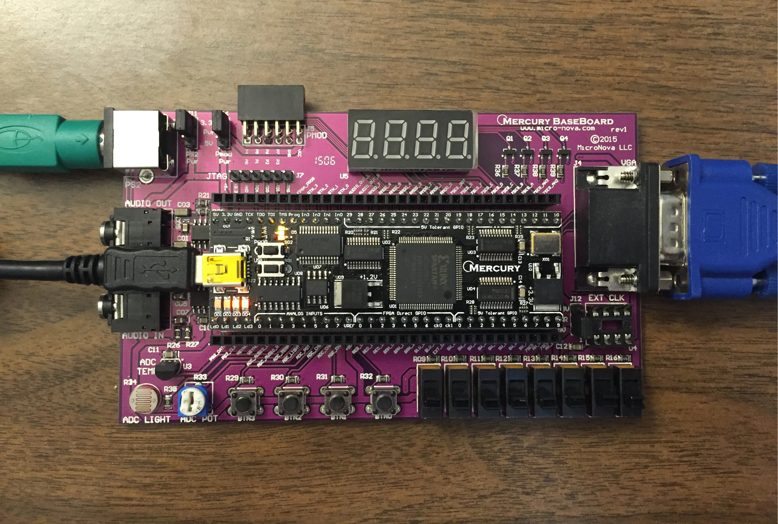Mercury ME1B-200M with baseboard, running the Mandelbrot explorer.  PS/2 mouse, potentiometer and push-buttons are used for user input. VGA monitor is used for output (800x600 @ 72Hz)