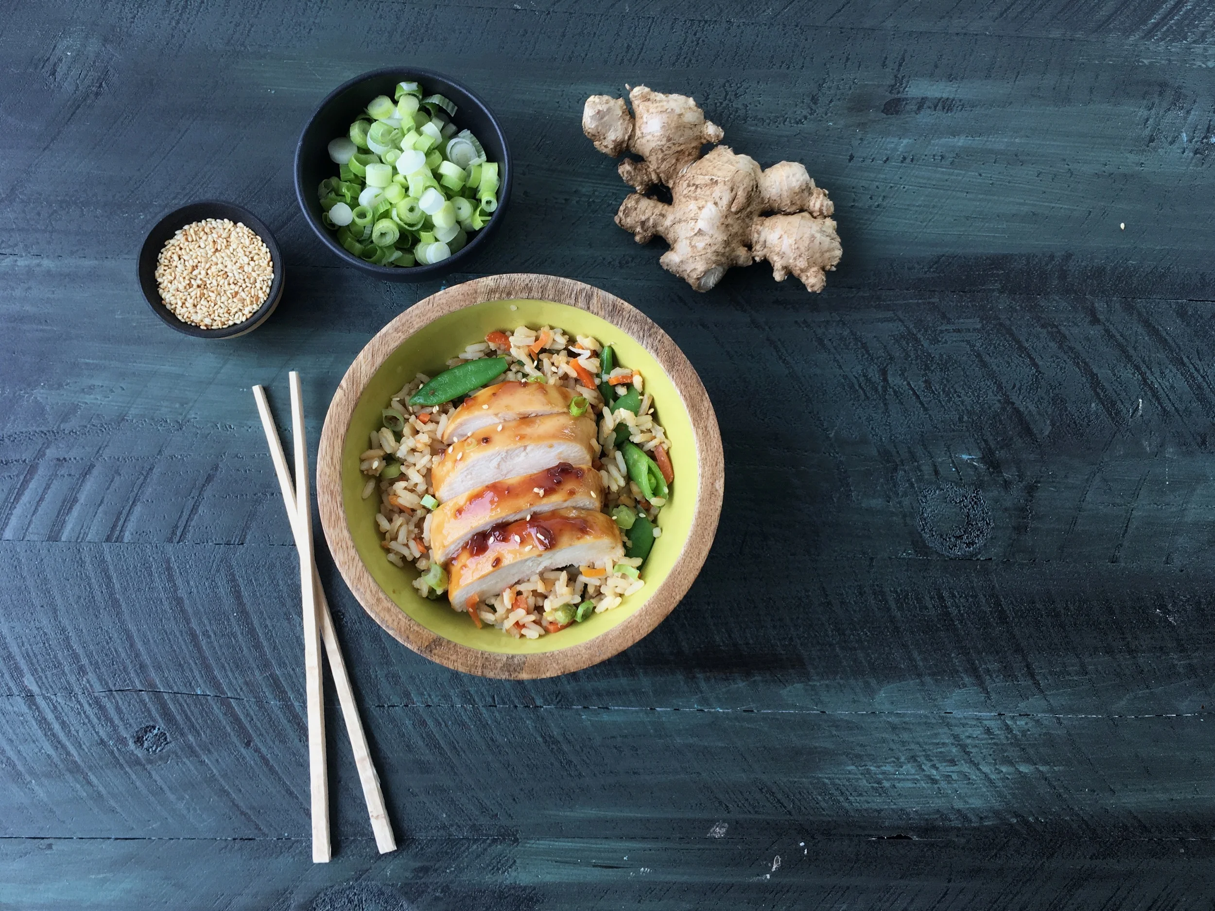 This was the photo I took on my iPhone before the real food stylist came. I had the green onions on the chicken ALL wrong. Look at them. They're lopsided and unevenly scattered. The snow pea on the top left of the bowl is flat and shady. WHAT'S WRONG WITH ME?