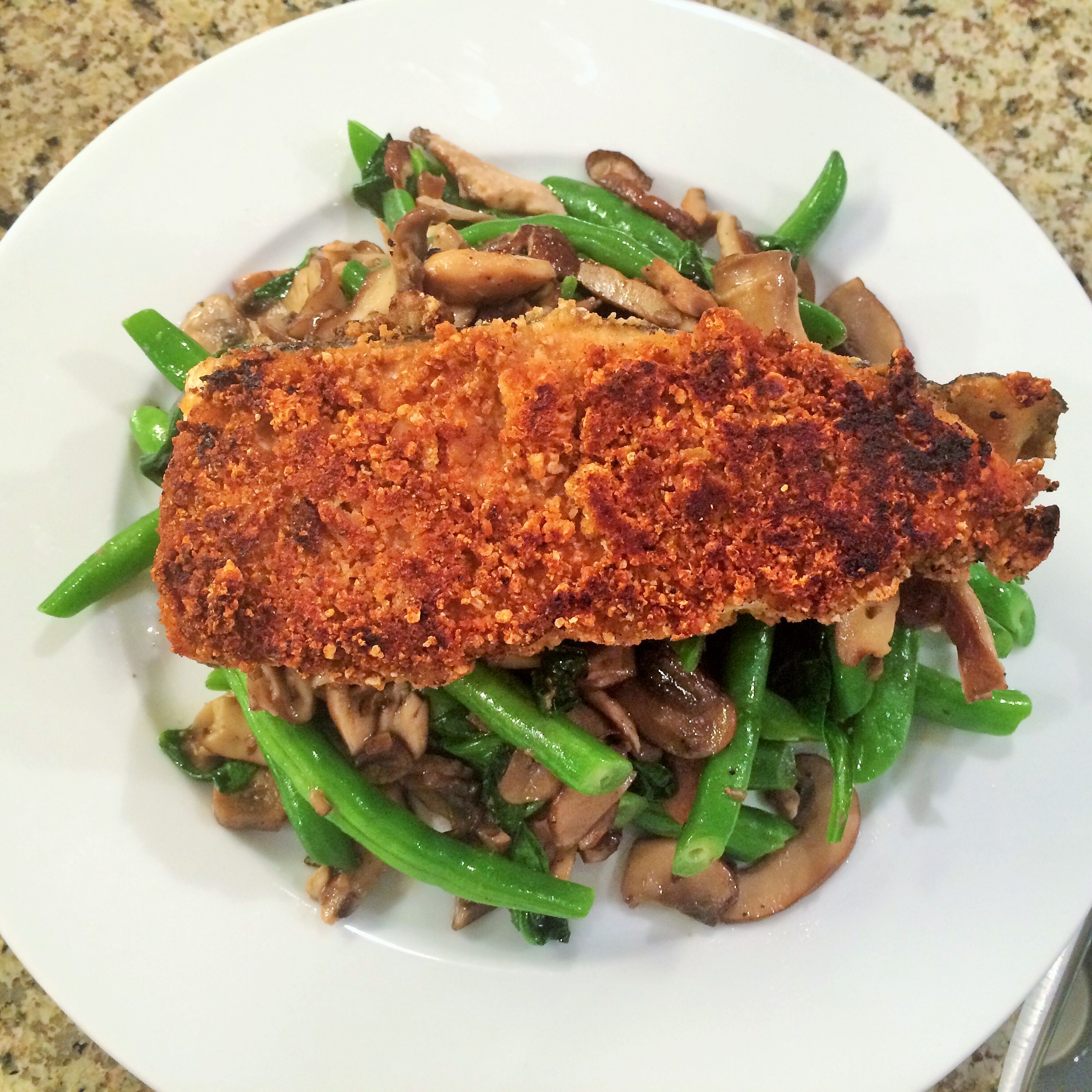 Pork Rind Crusted Swordfish, Mushroom and Bean Sautee with Bacon Jus