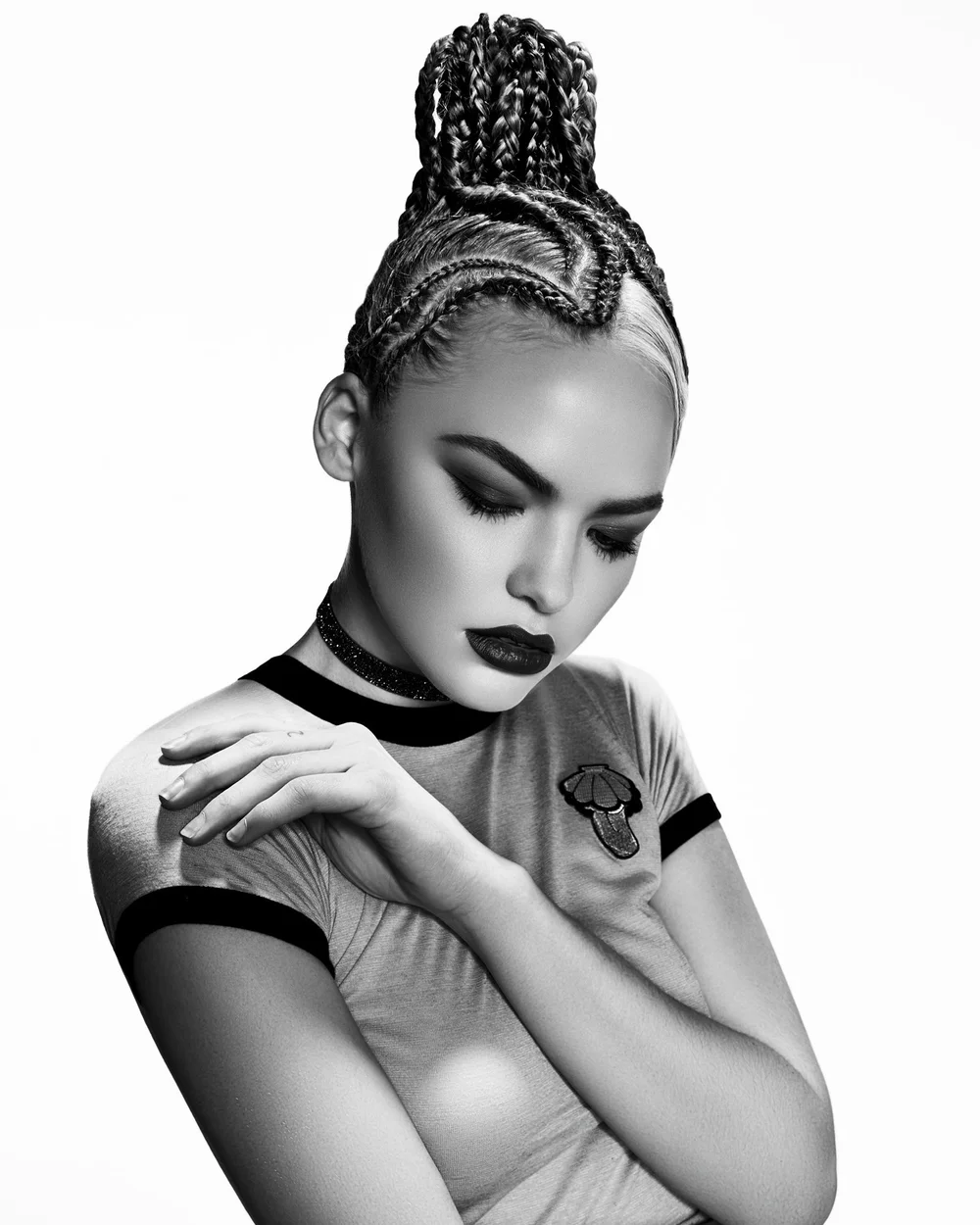 Braided texture and bold makeup in black and white — photographed by Sal Misseri