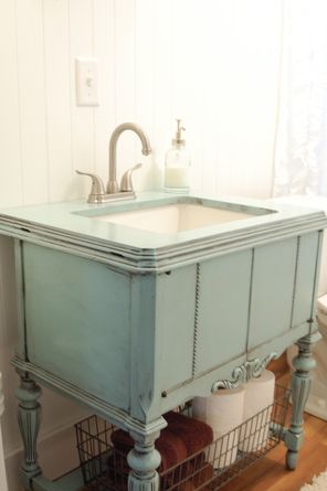 I just loved this Vanity made from a Vintage Sewing cabinet from : This Old House via Pinterest. Here is the before picture of the Sewing Cabinet that I purchased,