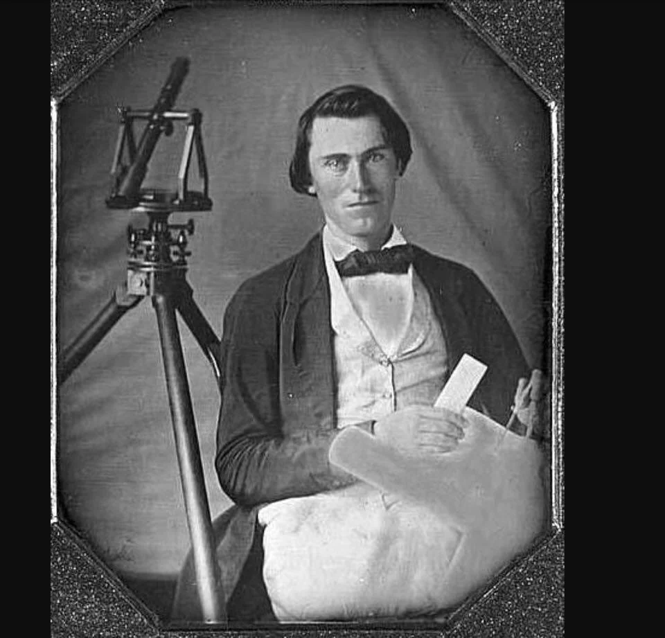 Photo of a young surveyor family reports attribute to their ancestor, Nicholas Trammell