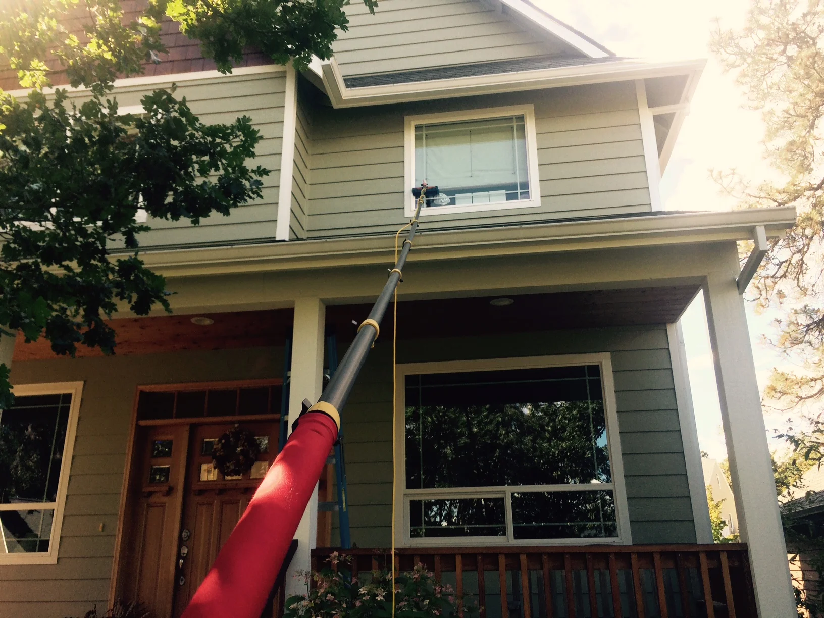 Residential water-fed pole window cleaning