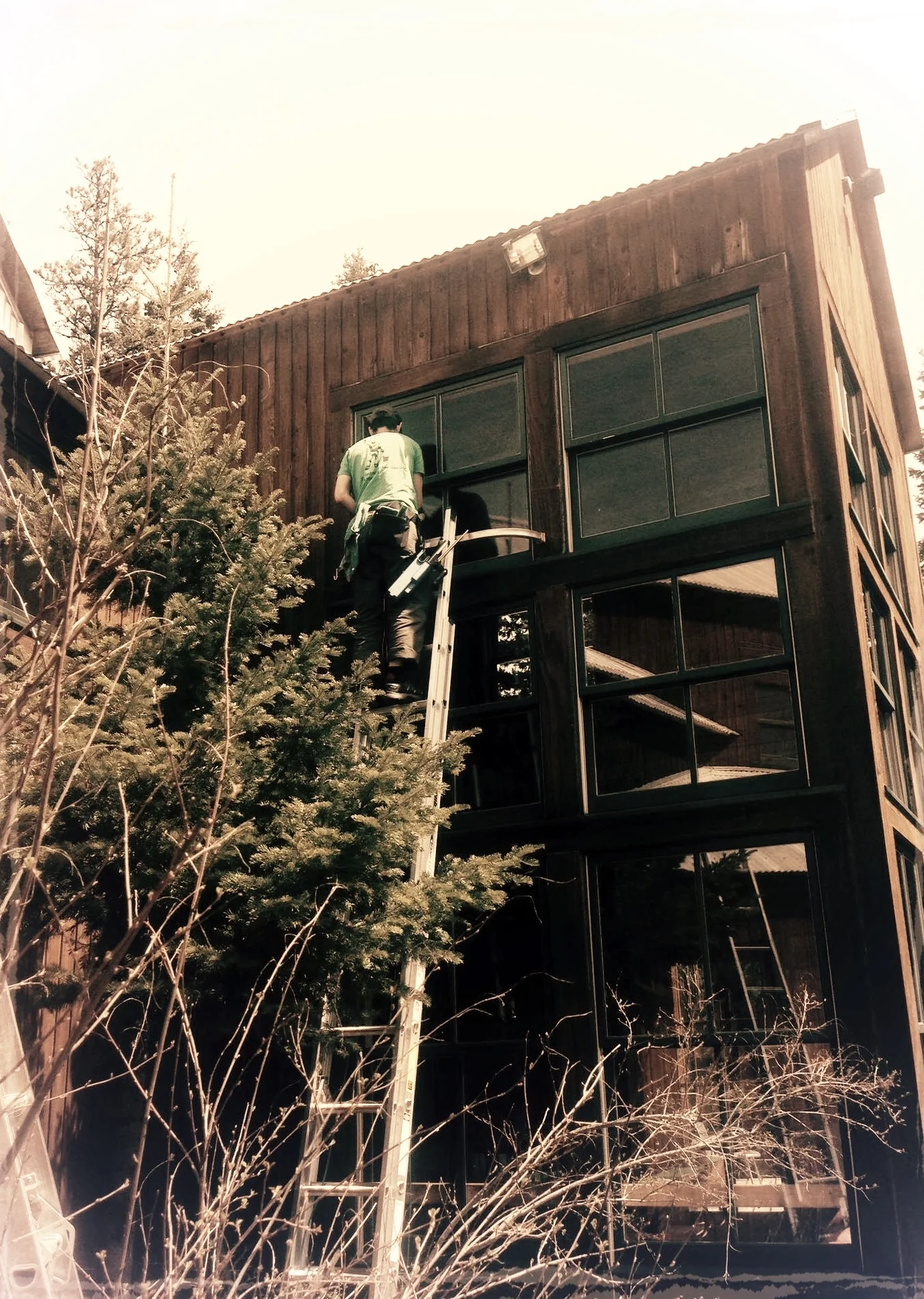 Exterior window washing from a ladder