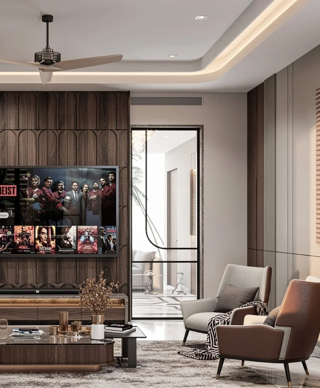 Modern living room with a wall-mounted flat-screen TV, beige and green armchairs, a wooden coffee table, indoor plants, and decorative items, with a door leading to a balcony or another room.