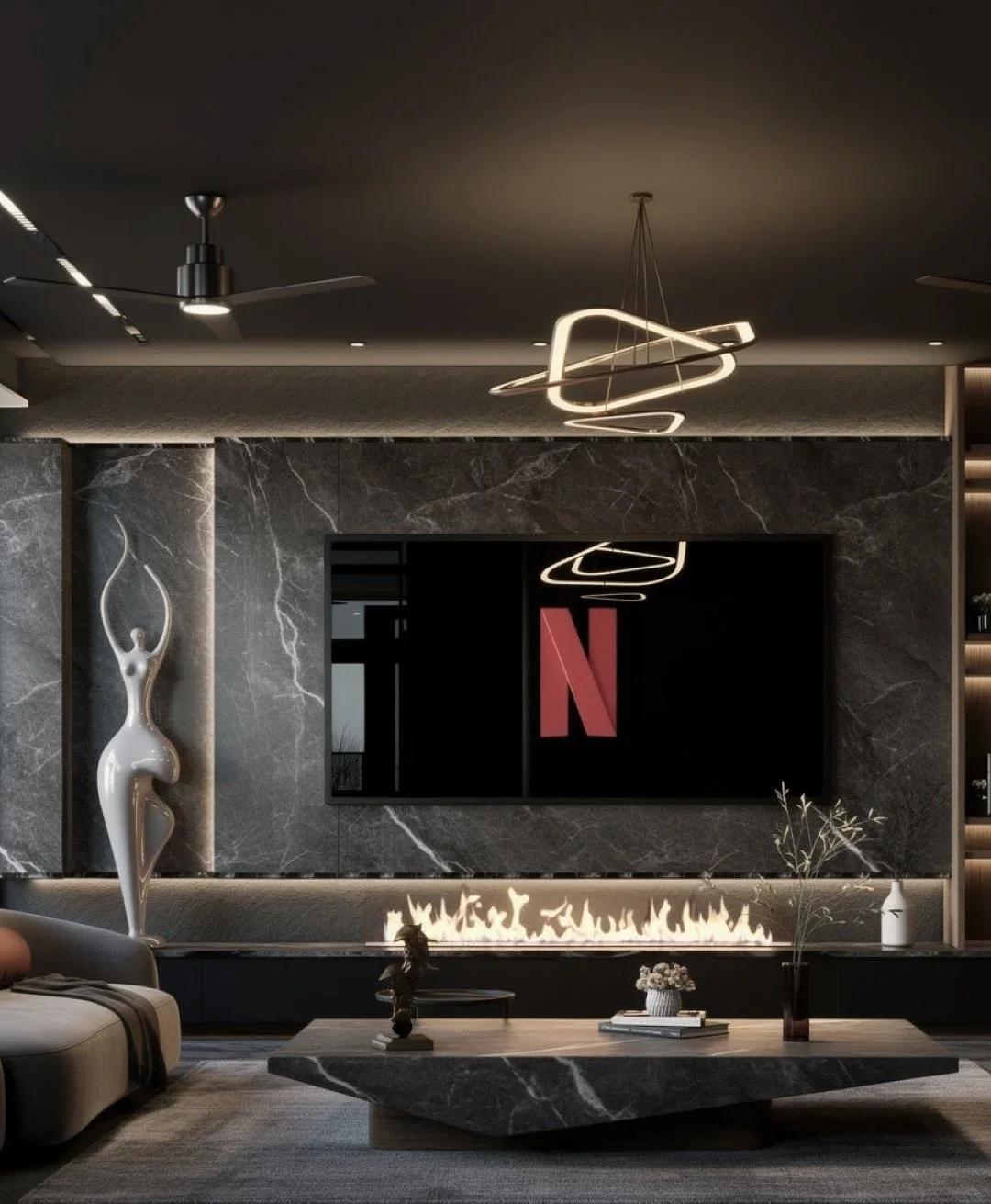 Modern living room with dark marble walls, a mounted flat screen TV showing a red Netflix logo, a decorative sculpture of a female figure on the left, and a marble coffee table with a vase and books. The ceiling features stylish lighting and a ceilin