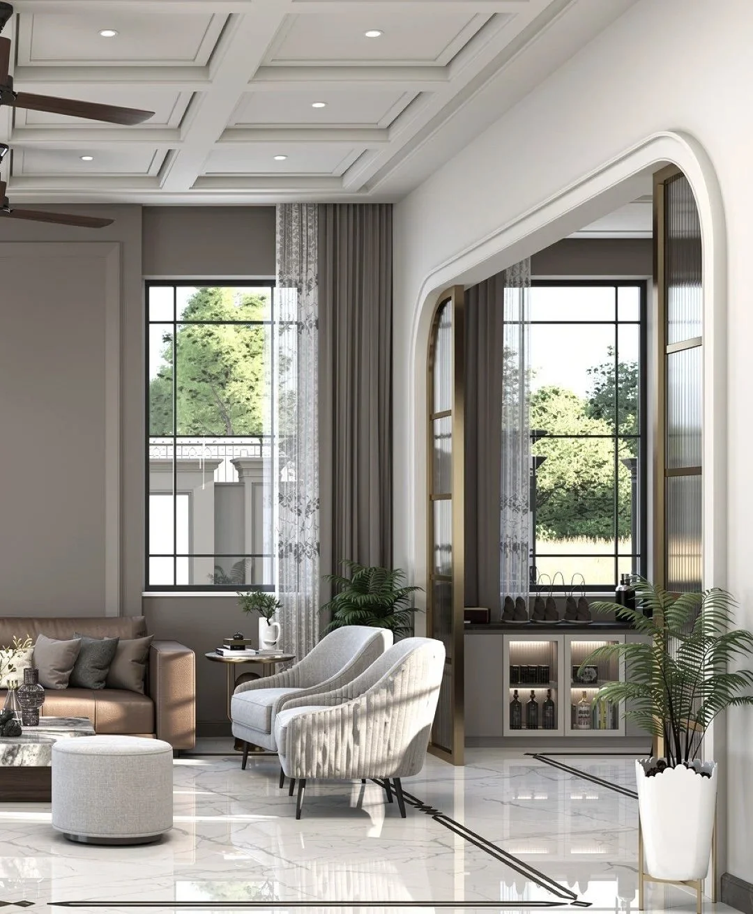 Modern living room with large windows, elegant beige and gray furniture, decorative plants, and gold accents.