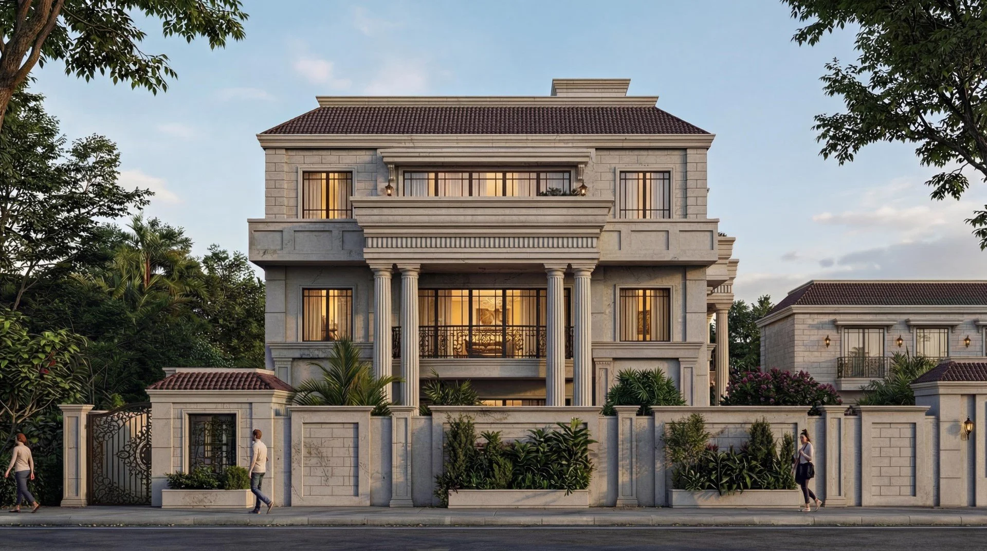 A large, luxurious stone house with columns and multiple windows, surrounded by greenery, with a stone wall and gate at the front, and people walking nearby.