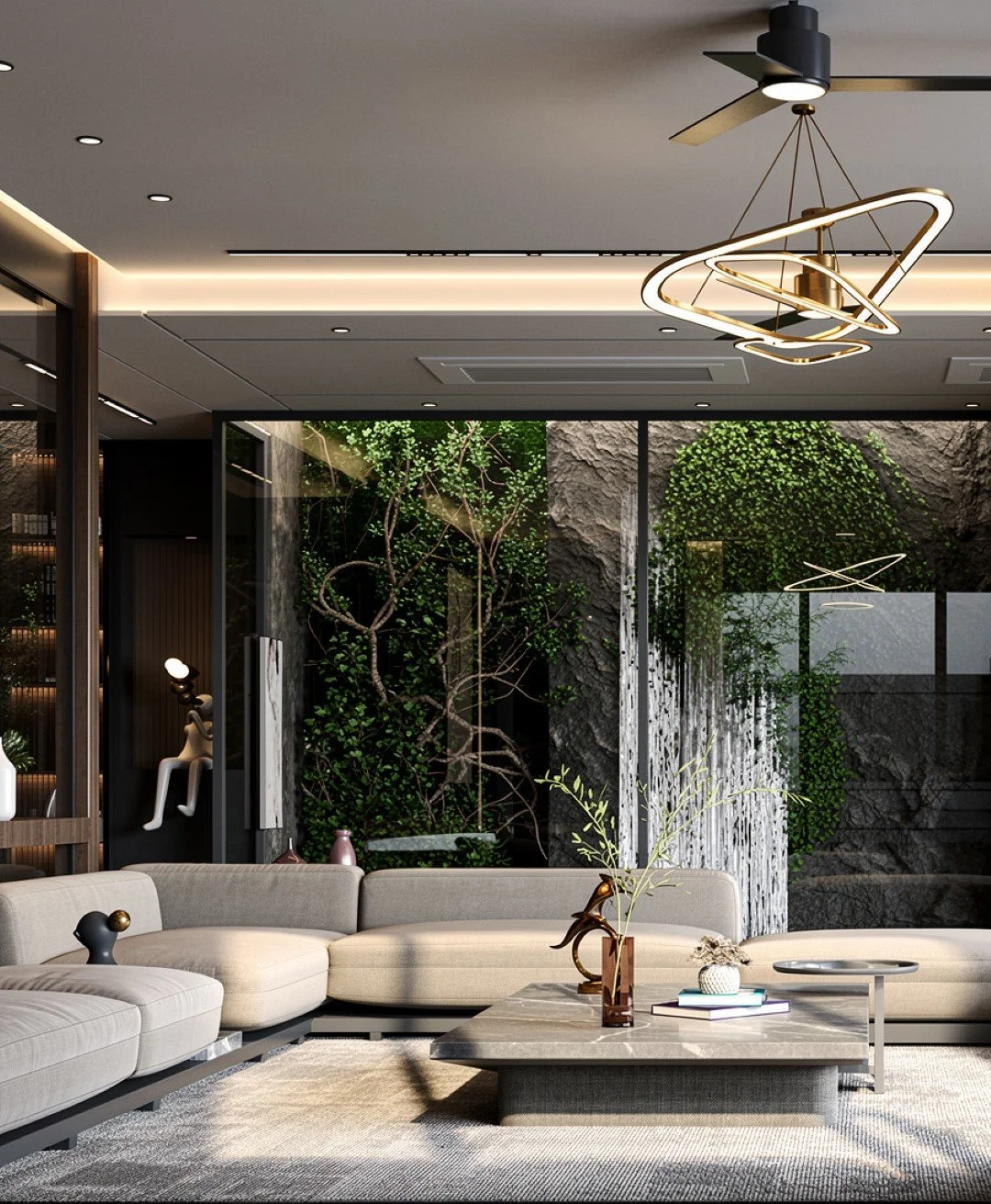 Modern living room with beige sectional sofa, marble coffee table with decorative vases and books, abstract hanging light fixtures, and a large glass wall with trees outside.