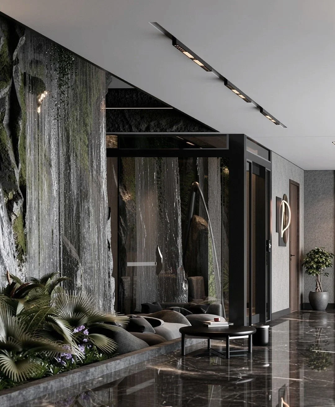 Modern interior lobby with a waterfall feature, plush seating, a potted plant, and contemporary lighting.