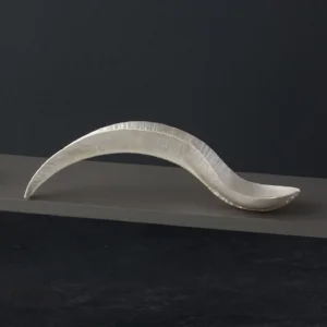 I recently completed our first silverware commission - a caddy spoon. Our client, a fellow jeweller, was much taken with the Folded Fletch spoons but the compartments of the display case for her collection were of very specific dimensions, so she requested I make one to fit.