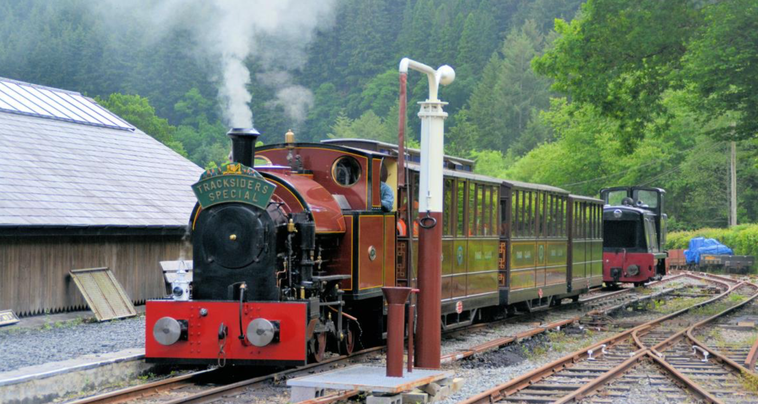 No 7 with three bogie coaches leaving Maespoeth Junction on its return to Corris