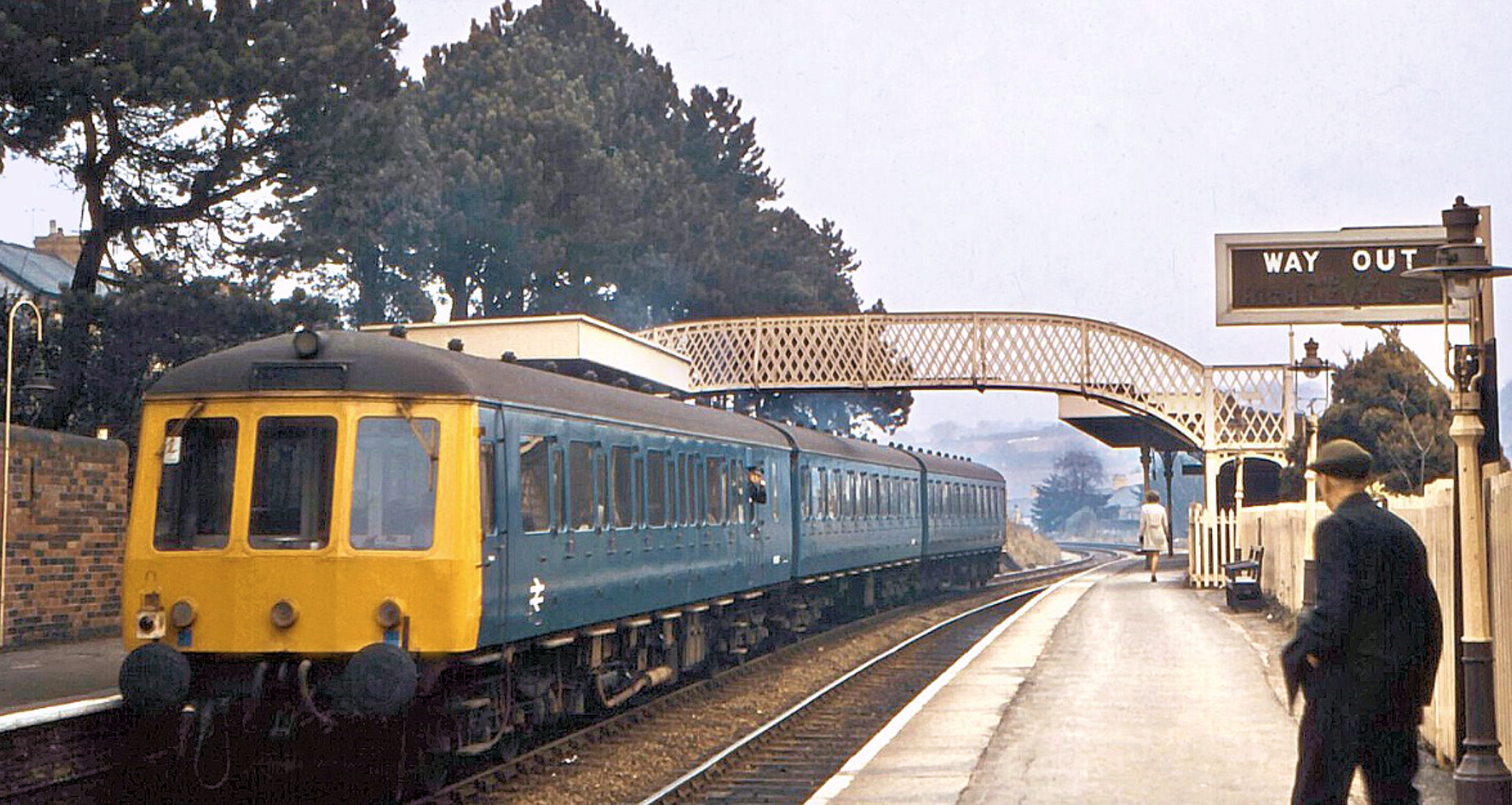 Another of Robert Masterman’s evocative photographs chronicling diesel multiple units in the South Wales Valleys in the 60s and 70s. This time, a plain blue-liveried 3 car DMU departs Hengoed Low Level with a Penarth to Rhymney service in 1968.