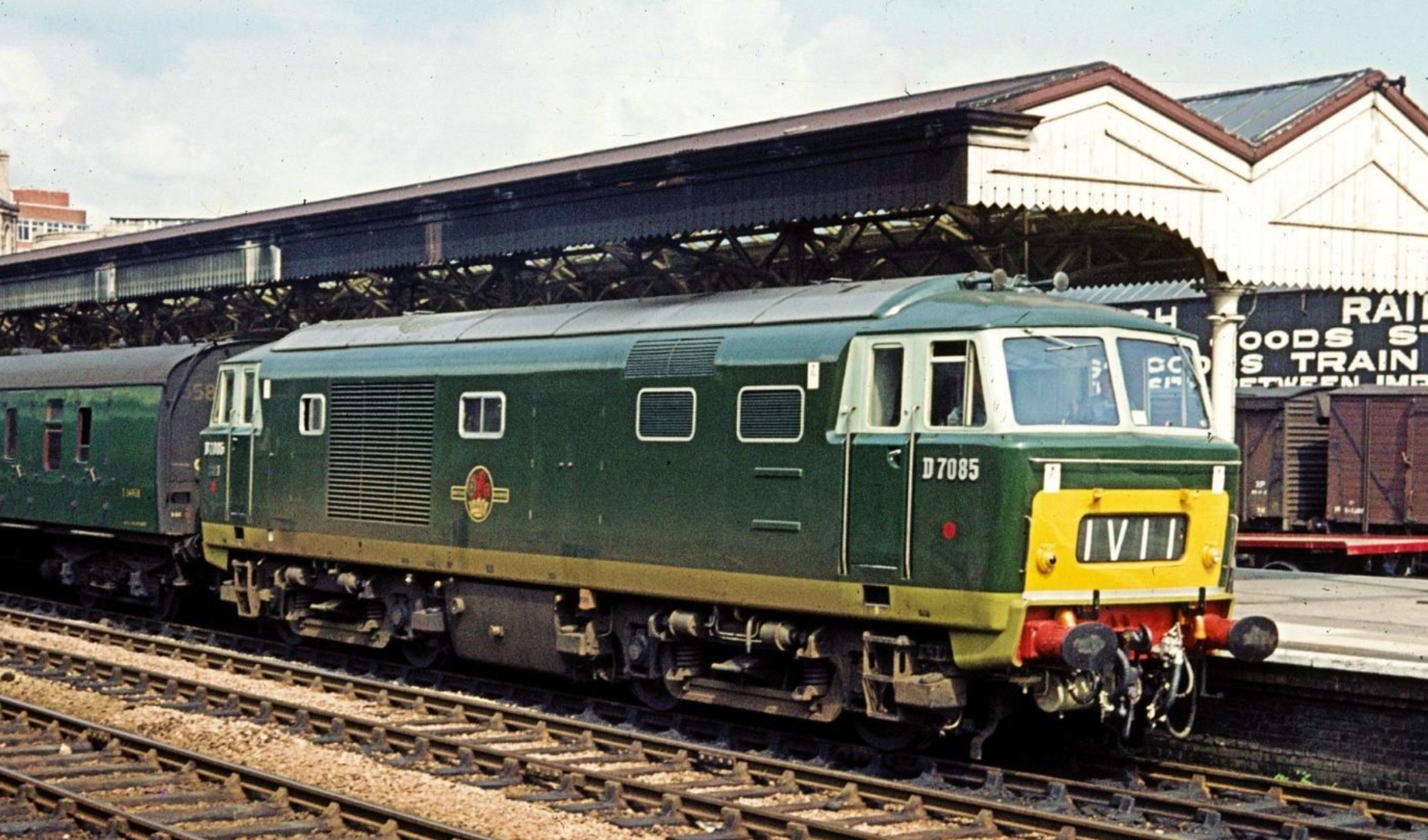 A stunning photograph taken in July 1963. Hymek D7085 is heading a rake of SR green-liveried Mk 1's on the mid-day SO Portsmouth & Brighton to Swansea, calling at Newport High Street at 16.15. A useful reference photo for weathering that pristine Heljan Hymek you have safely boxed away, too. Photograph posted by kind permission of Christopher Gwilliam.