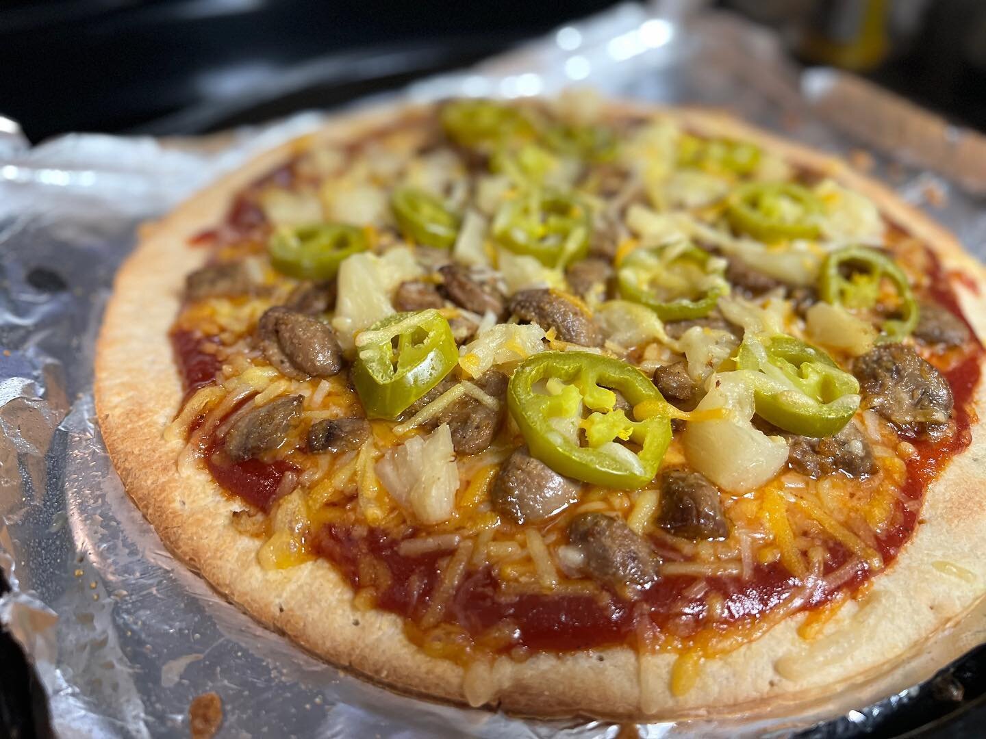 Thin crust dough topped with marinara mixed Sweet and spicy barbecue sauce, pineapple, jalape&ntilde;os, grilled mushroom and vegan a Mexican cheese blend!