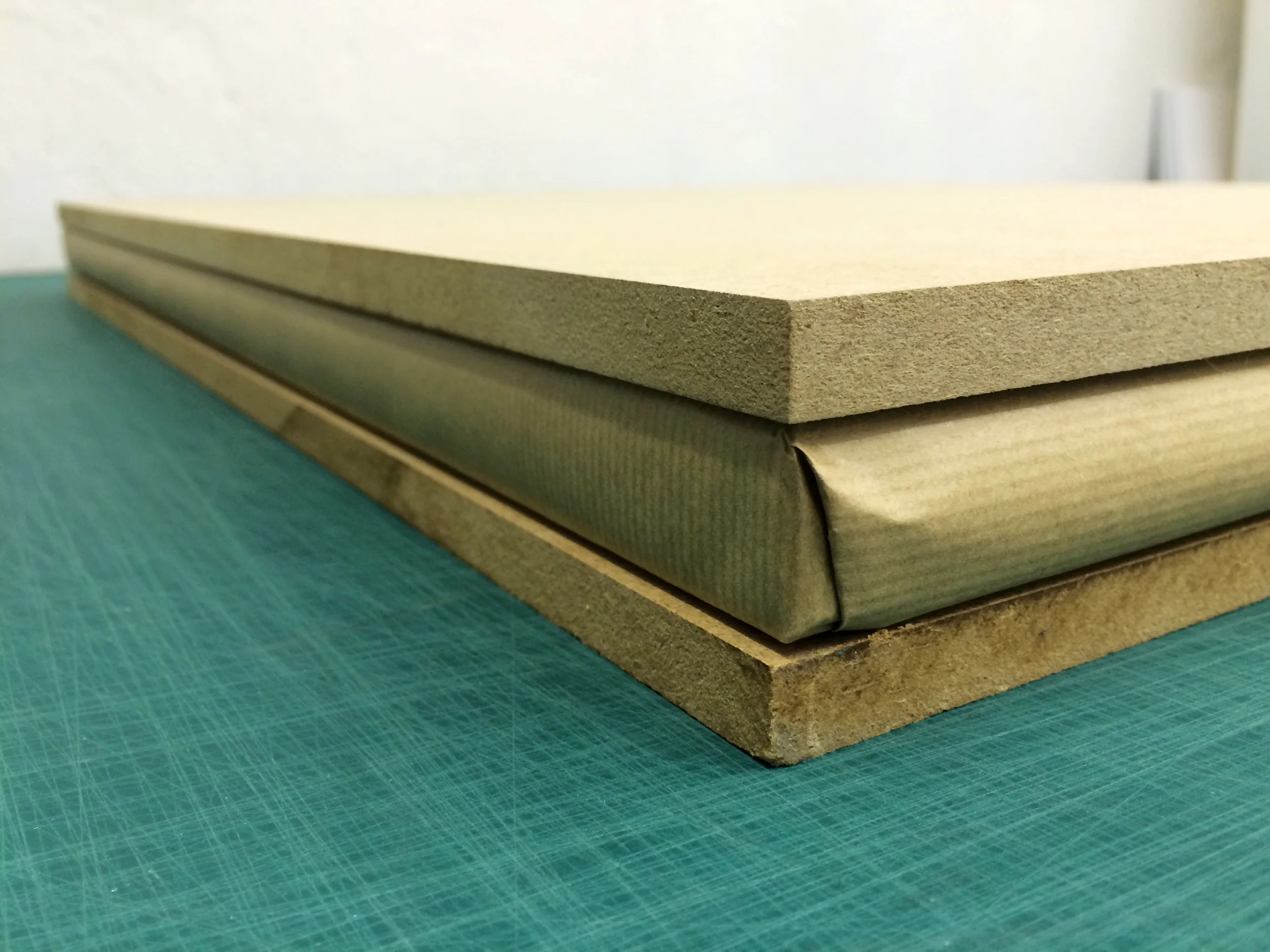 Print box sandwiched between two 12mm/0.5 inch sheets of MDF/wood.
