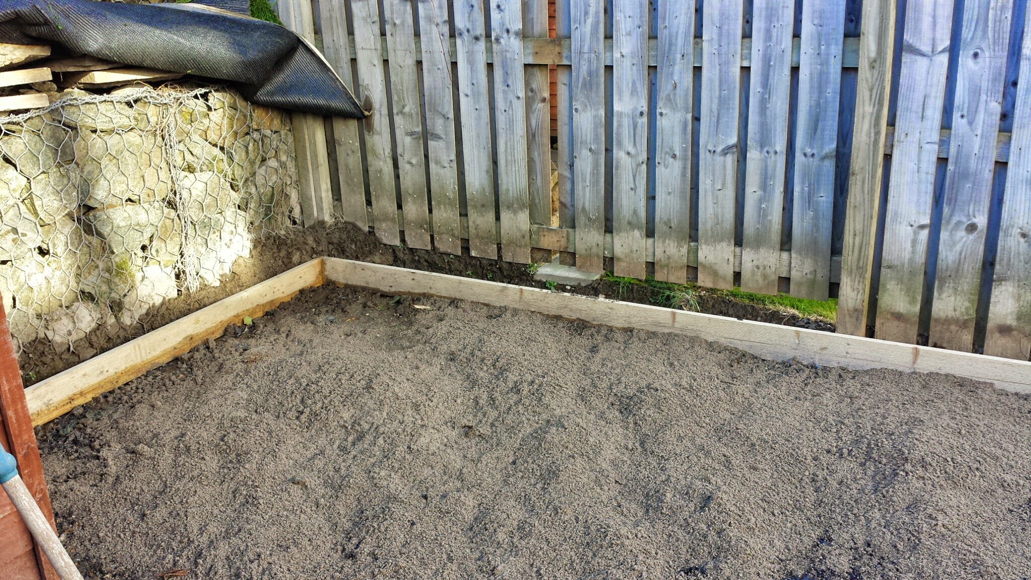sloped garden Terrace area prior to install