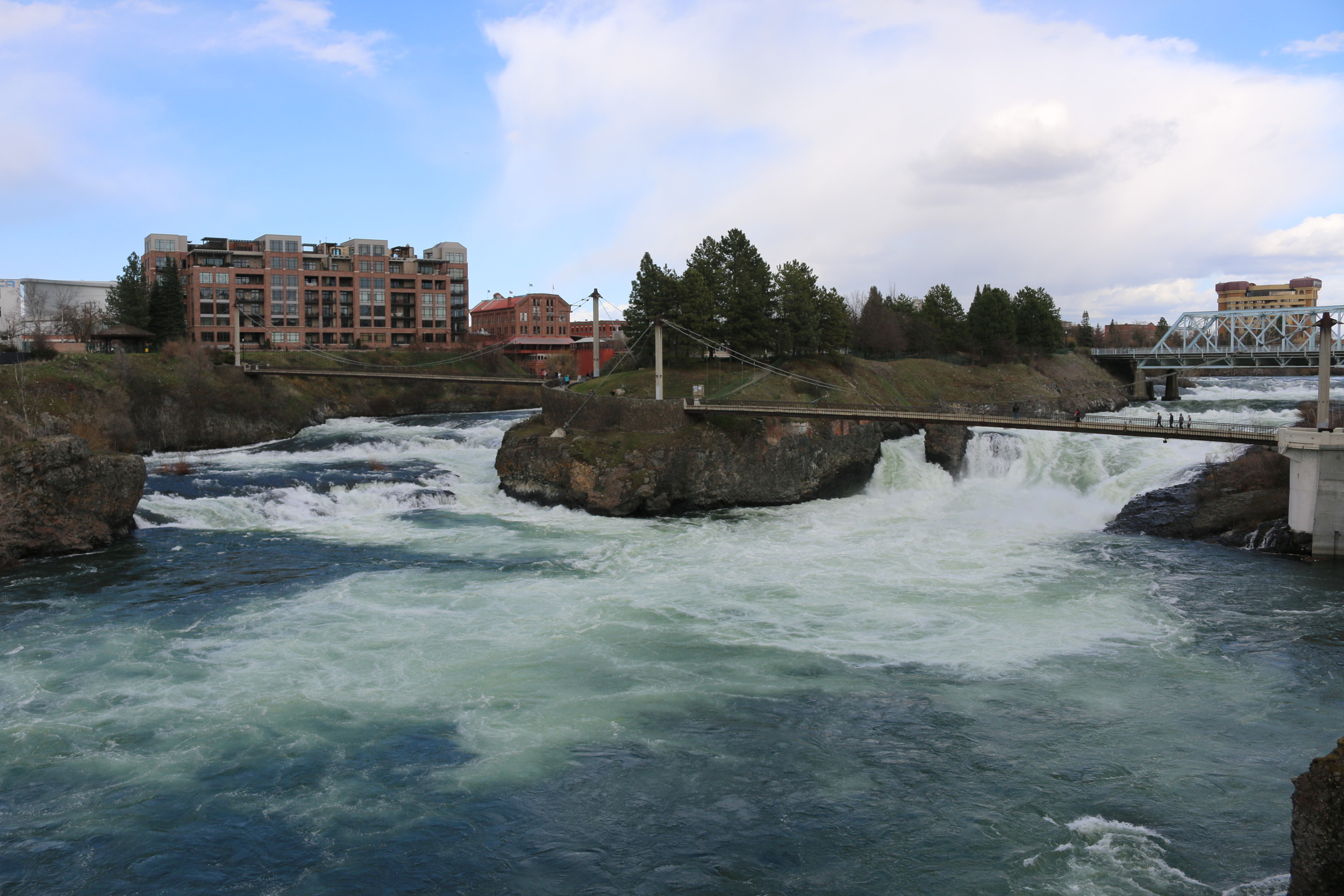 Spokane Falls flowing by Canada Island