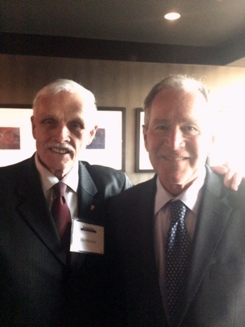 Source James Martin (left) with former President Bush