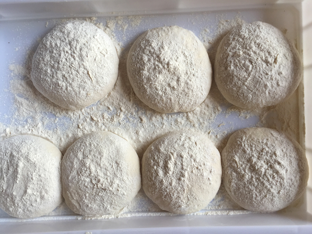 dough balls ready for second rise before cooking