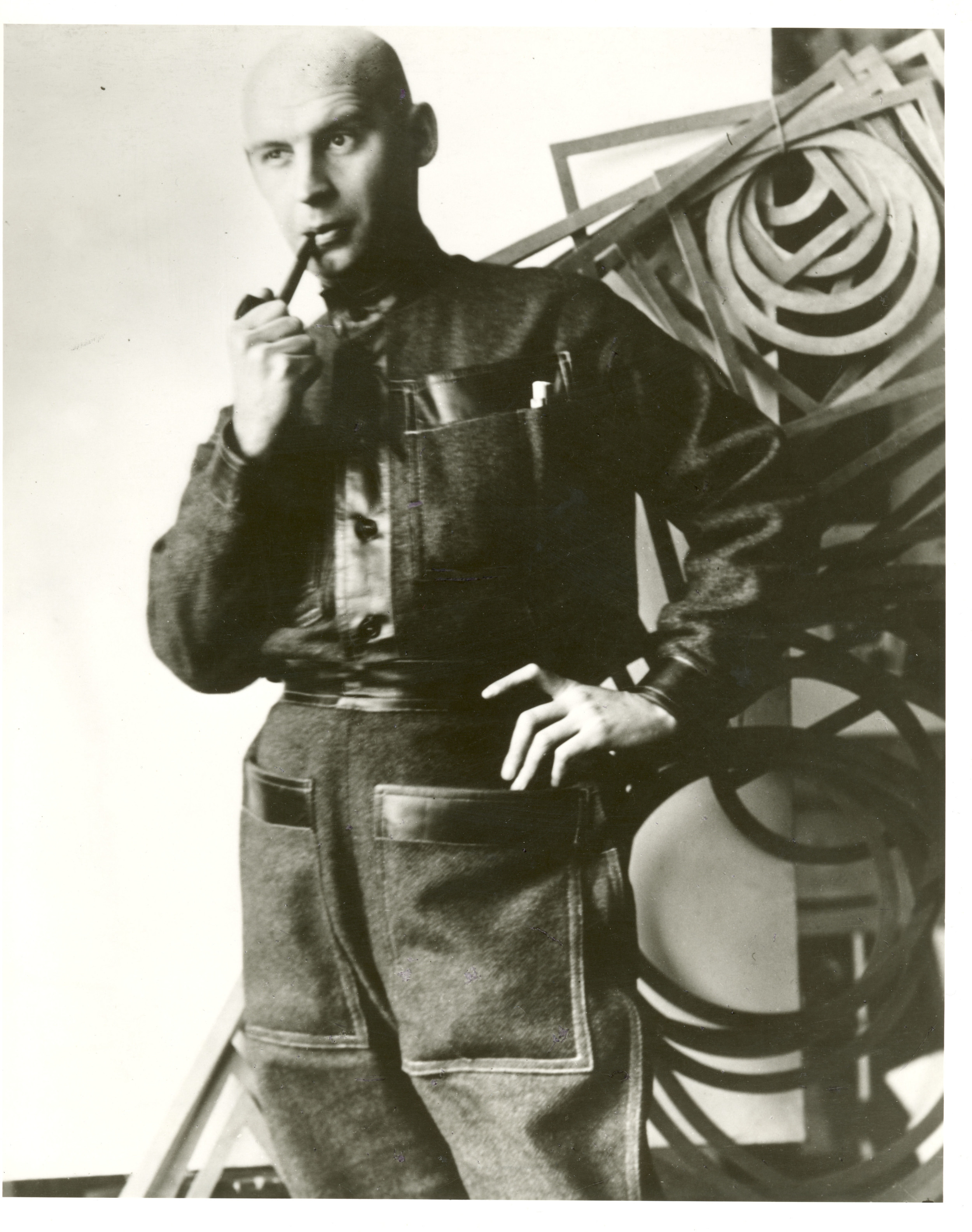 A.-Rodchenko-wearing-a-working-form-designed-by-him-1924.jpg