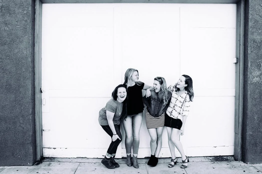 four women laughing.jpeg