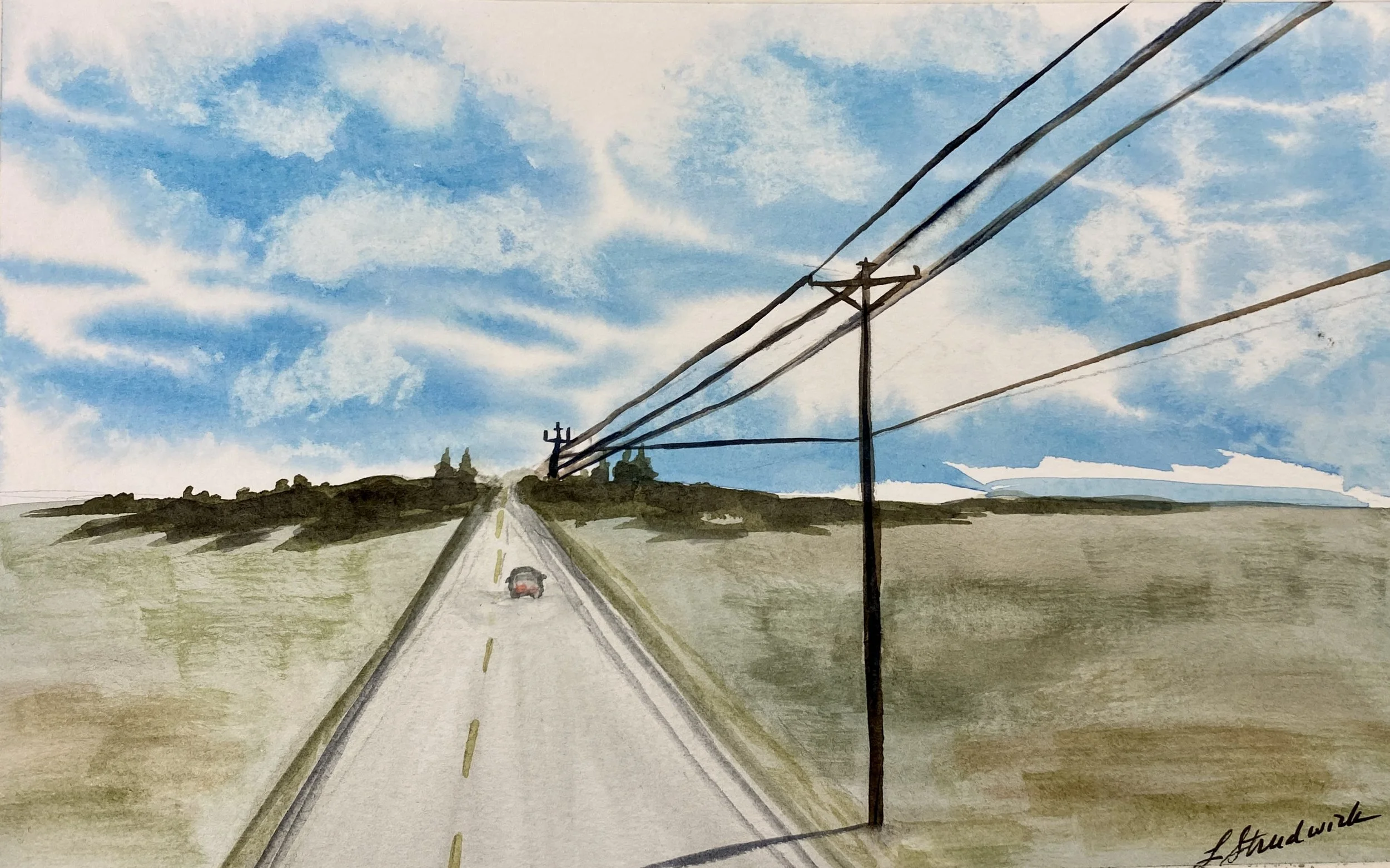 Highway receding into distance with wires