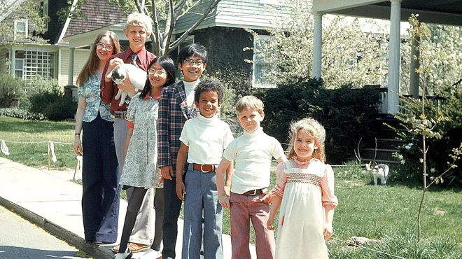 OUTSIDE LOOKING IN: TRANSRACIAL ADOPTION IN AMERICA (2002) by Phil Bertelsen