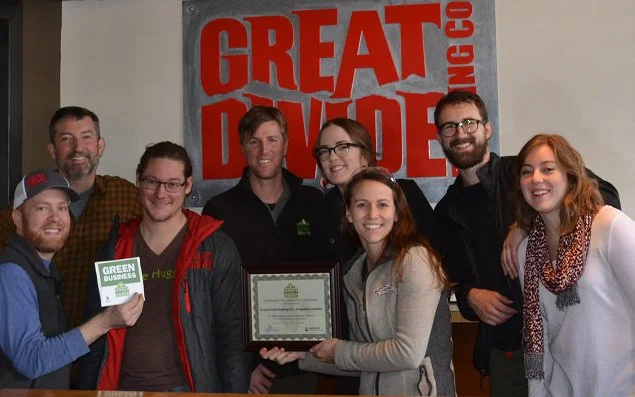 Members of the Great Divide team pose with their newly acquired grant. Photo courtesy of Great Divide Brewing Company