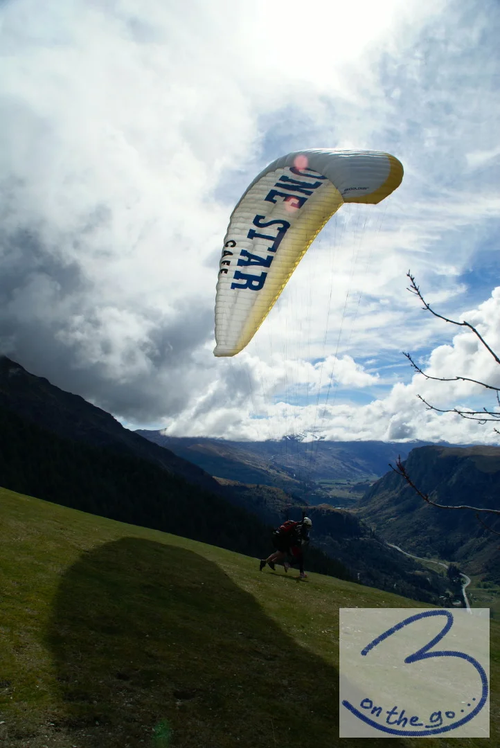Paragliders above Queenstown