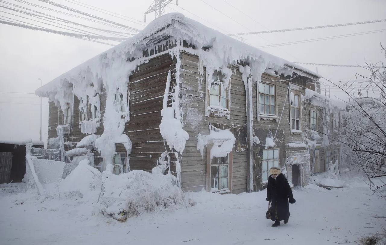 Warm draughts of air escaping this house freeze into puffs of ice which form, fall and reform throughout winter. 