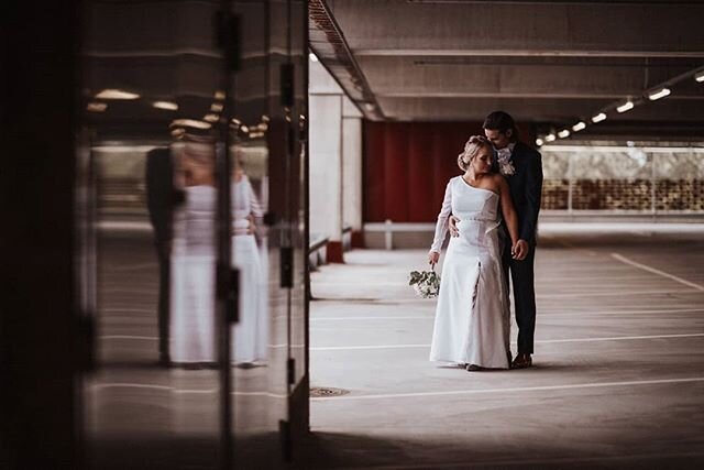 Sometimes the most mundane surroundings can make for an excellent wedding portrait surrounding! This couple had the most amazing mindset about taking some of their couple photos in a parking garage &lt;3. Congrats Tia&amp;Toni!

Ps. The pouring rain 