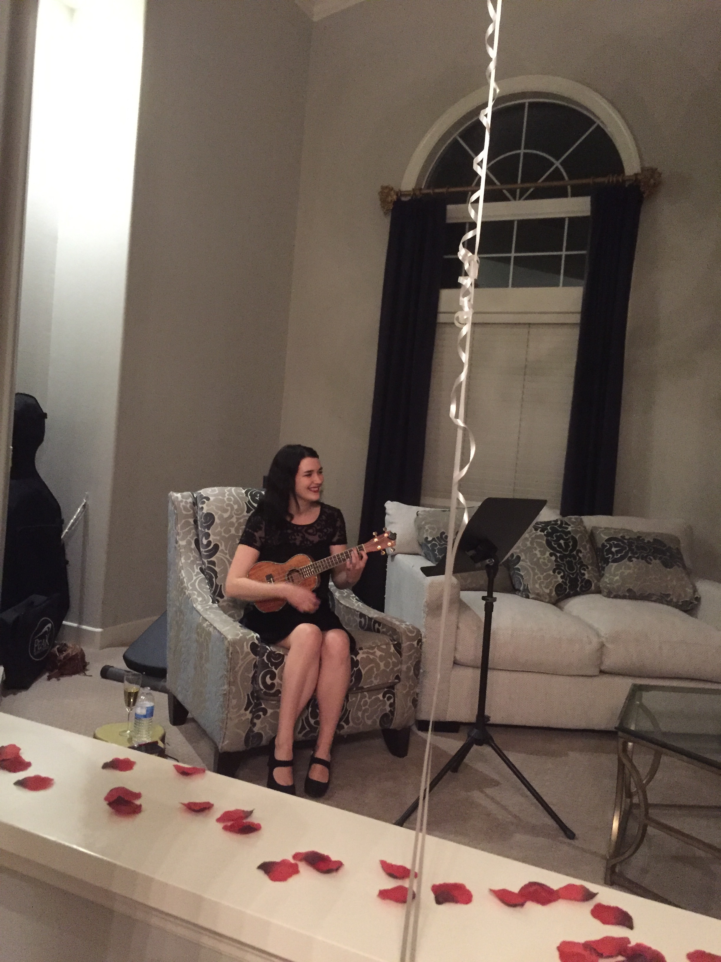 i had the honor of singing/ playing for a private proposal dinner. with balloons and rose petals everywhere, a private chef, and live music, how could she say no?!?