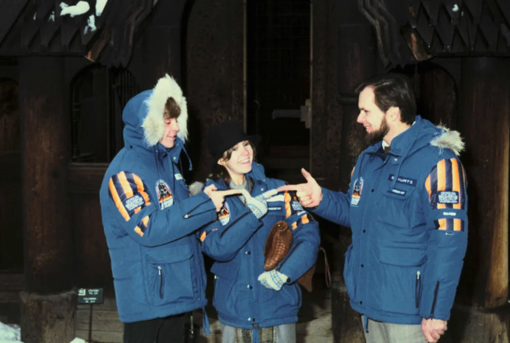 Mark Hamill (Luke Skywalker), Carrie Fisher (Princess Leia) and producer Gary Kurtz in their Empire crew parkas (©Starwars.com)