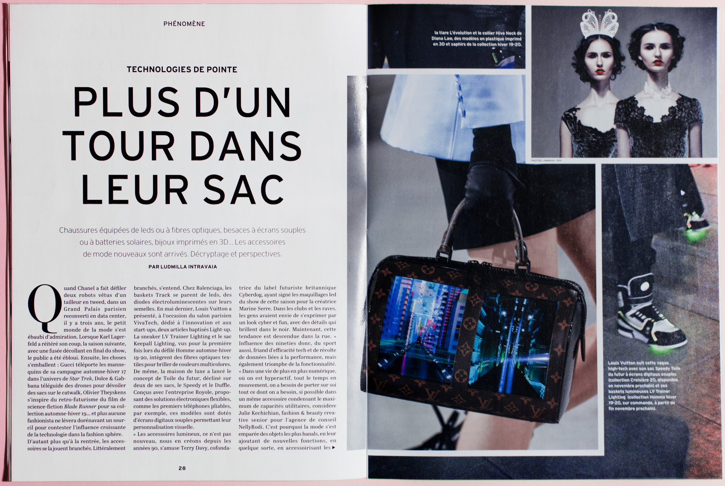 poster advertising Louis Vuitton handbag in paper magazine from