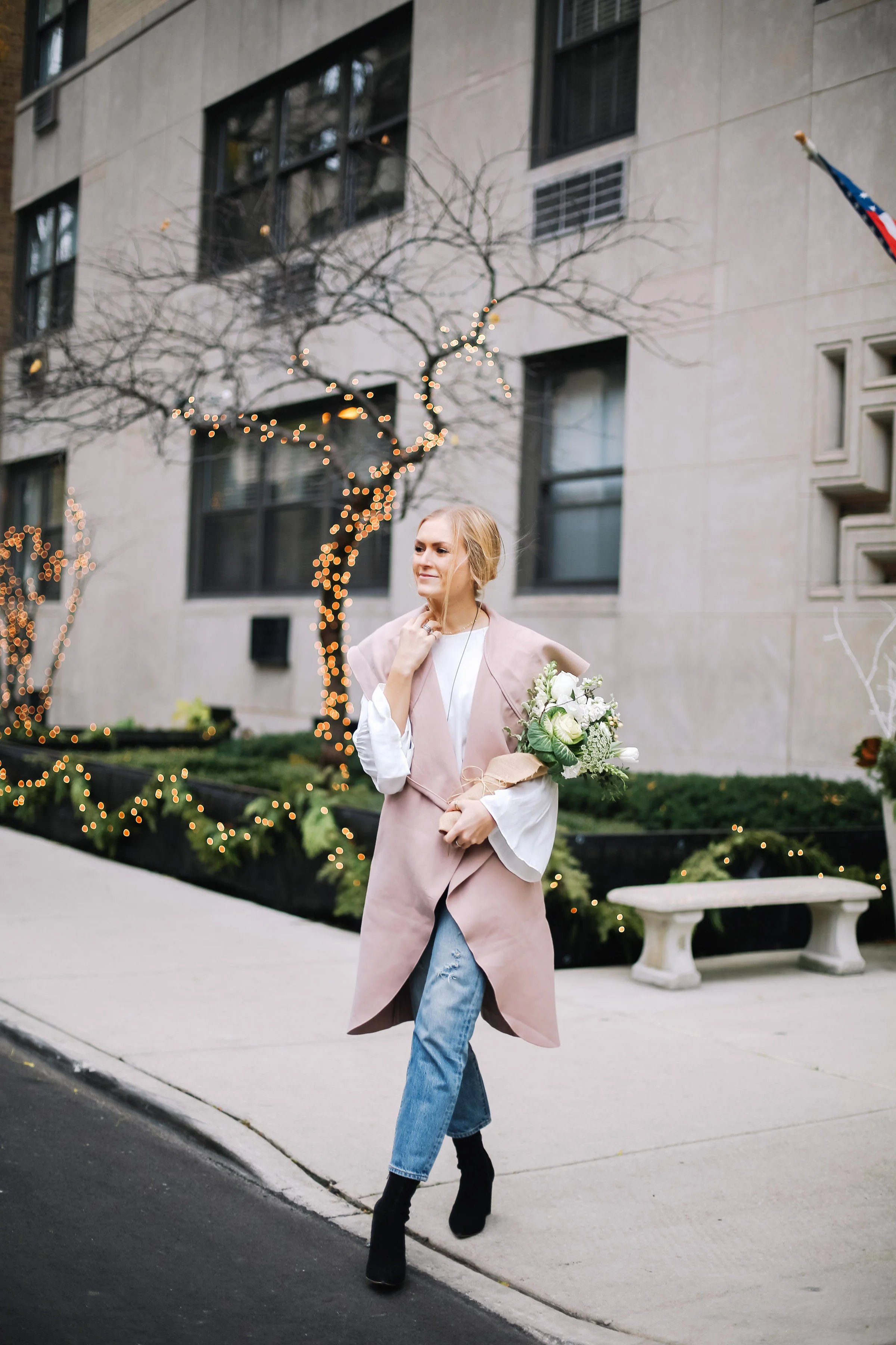 girl-carrying-flowers
