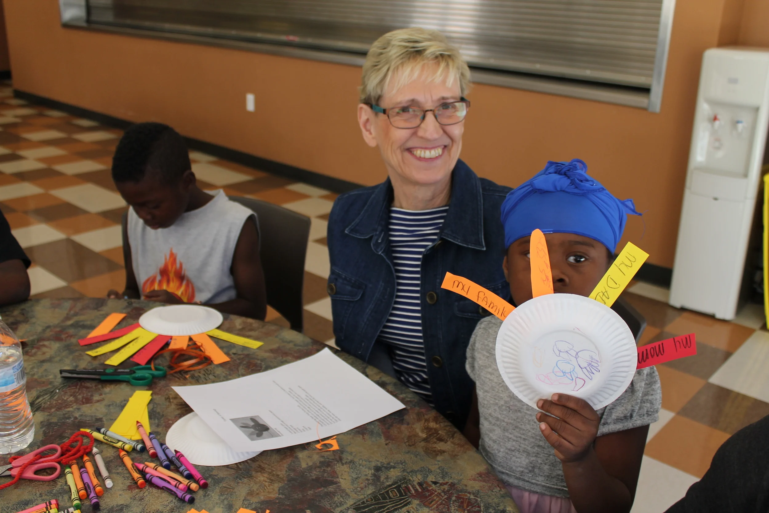 What thanks words would you write on your turkey feathers? Marilyn Roelse gathered the craft and Major Martha Davey gathered the shelter families for an afternoon of being grateful for what God has provided.