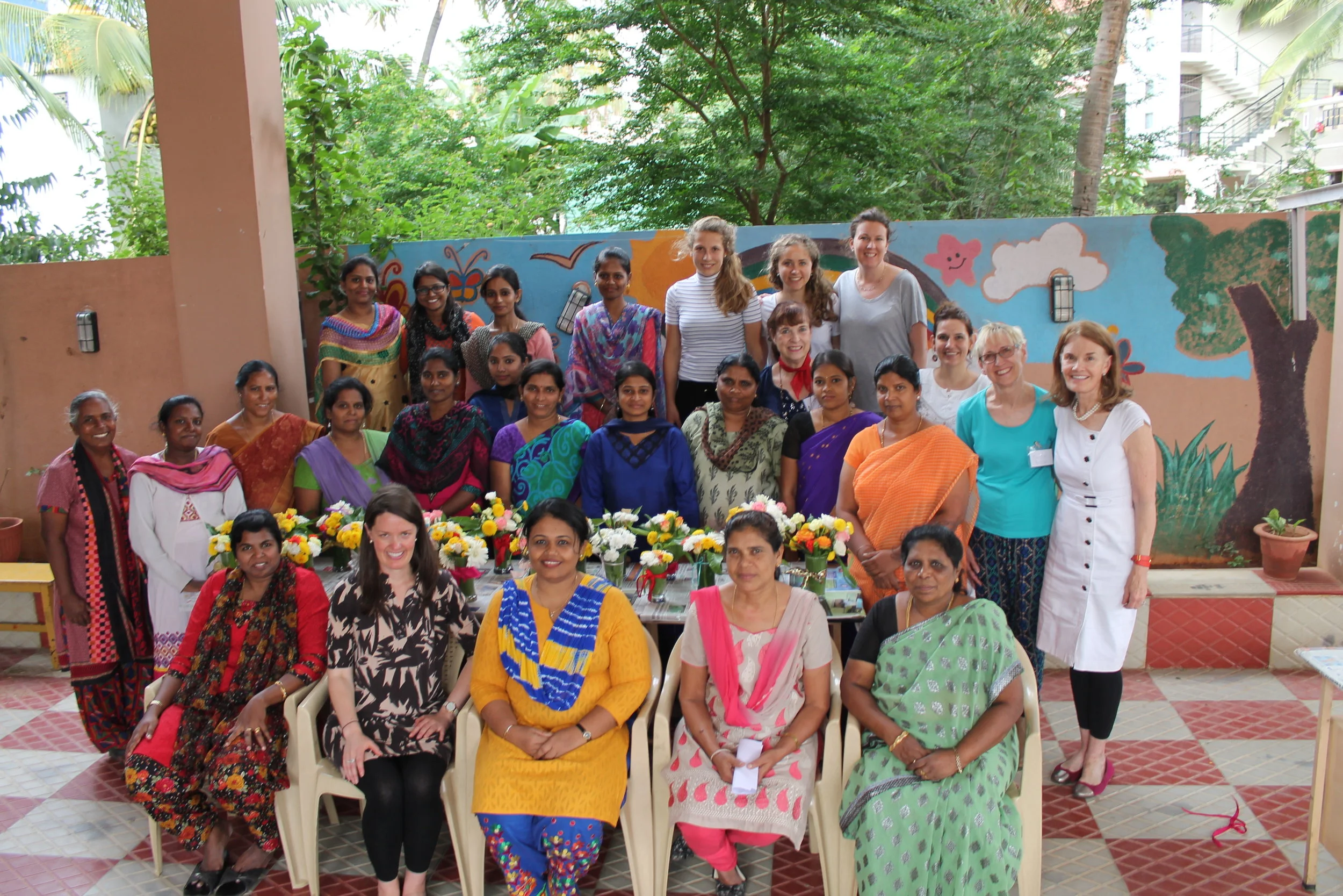 God provided an opportunity for us to serve in Southeast Asia this summer; we endeavored to model His kindness and grace. Above is the “after” shot from a flower-arranging class we presented to teachers at a school for children whose families live in the local slums. 