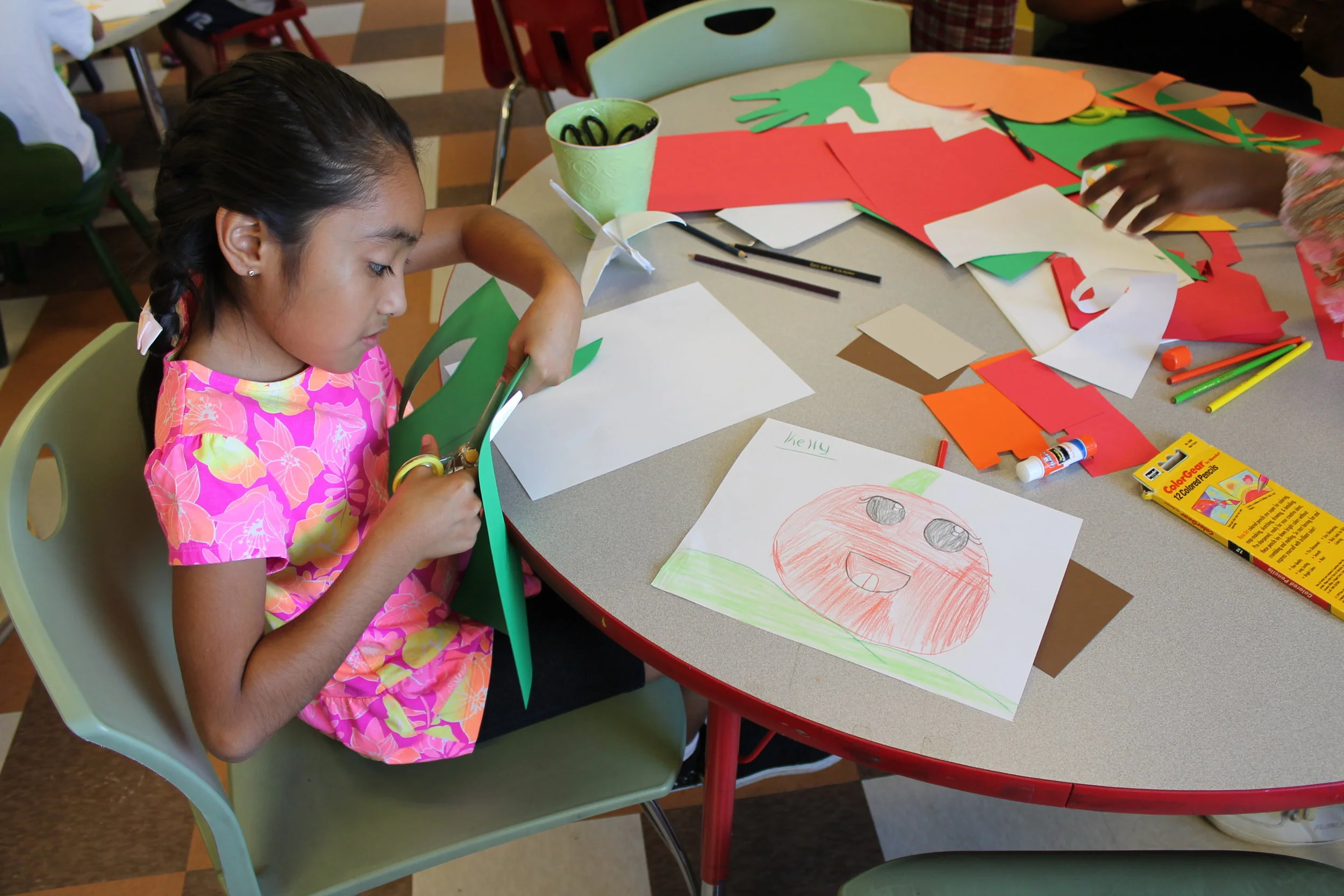 There are moments when crayons and colored pencils need help from construction paper and scissors. 