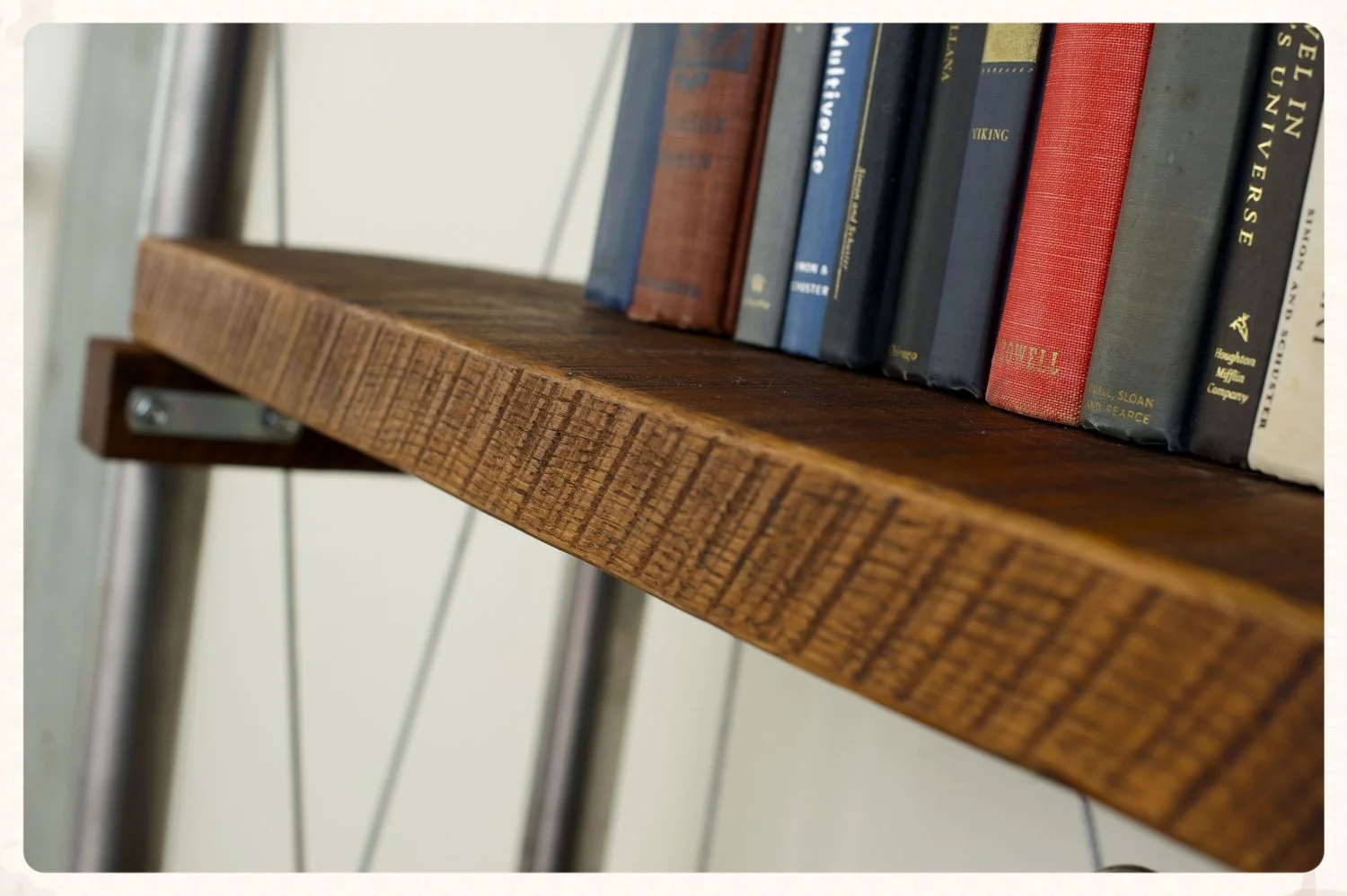 Dark raw tung oil fills in the detail enhancing the saw marks on rough sawn oak plank shelving.