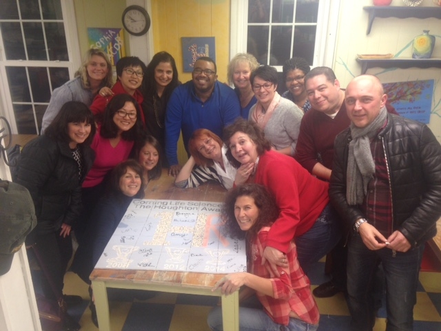 Corning HR team gathers to commemorate their third Houghton Award.