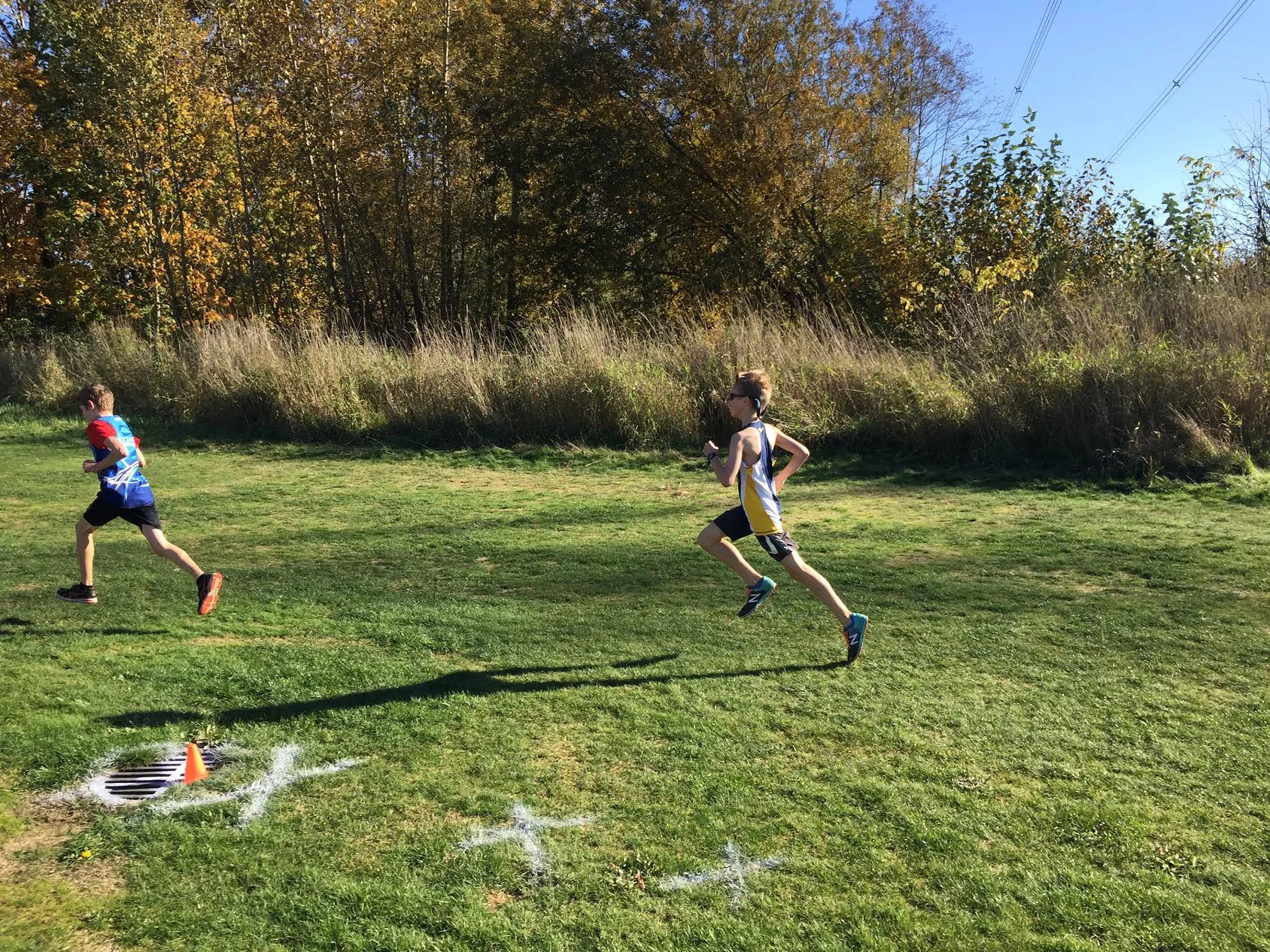 Kai Martland charges to a podium finish in the 11 year old boys race at BC XC Championships. 