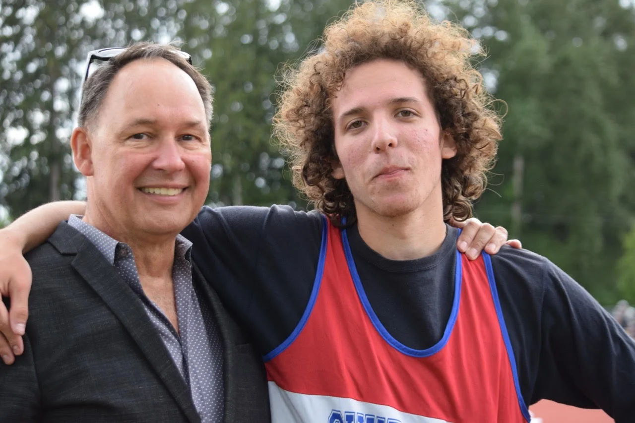 Luka Poljak with head High Jump Coach, Larry Blaschuk