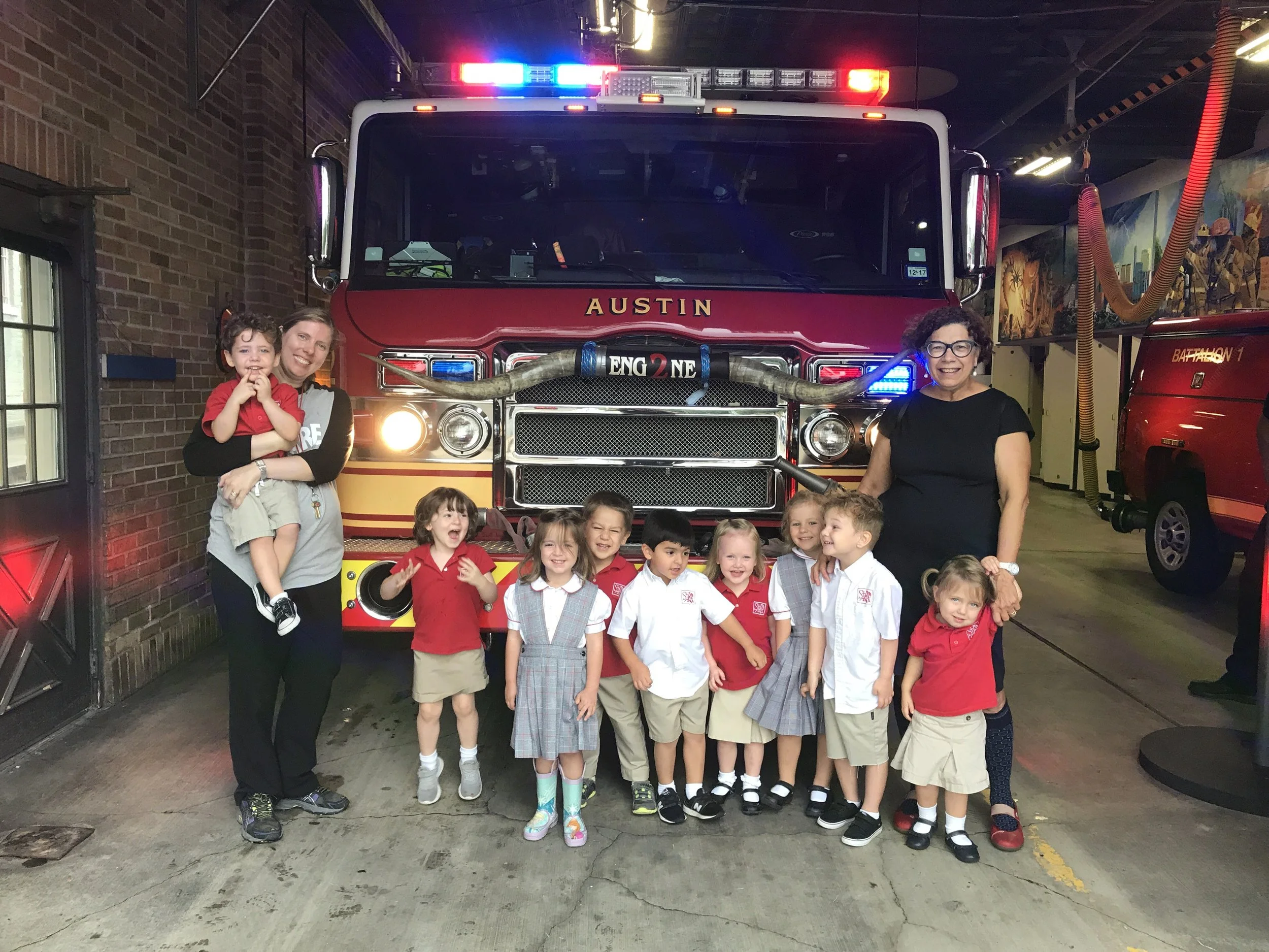 PK 3 class on a field trip to the local Fire Station with teachers Ms. Bush and Ms. Fleming 