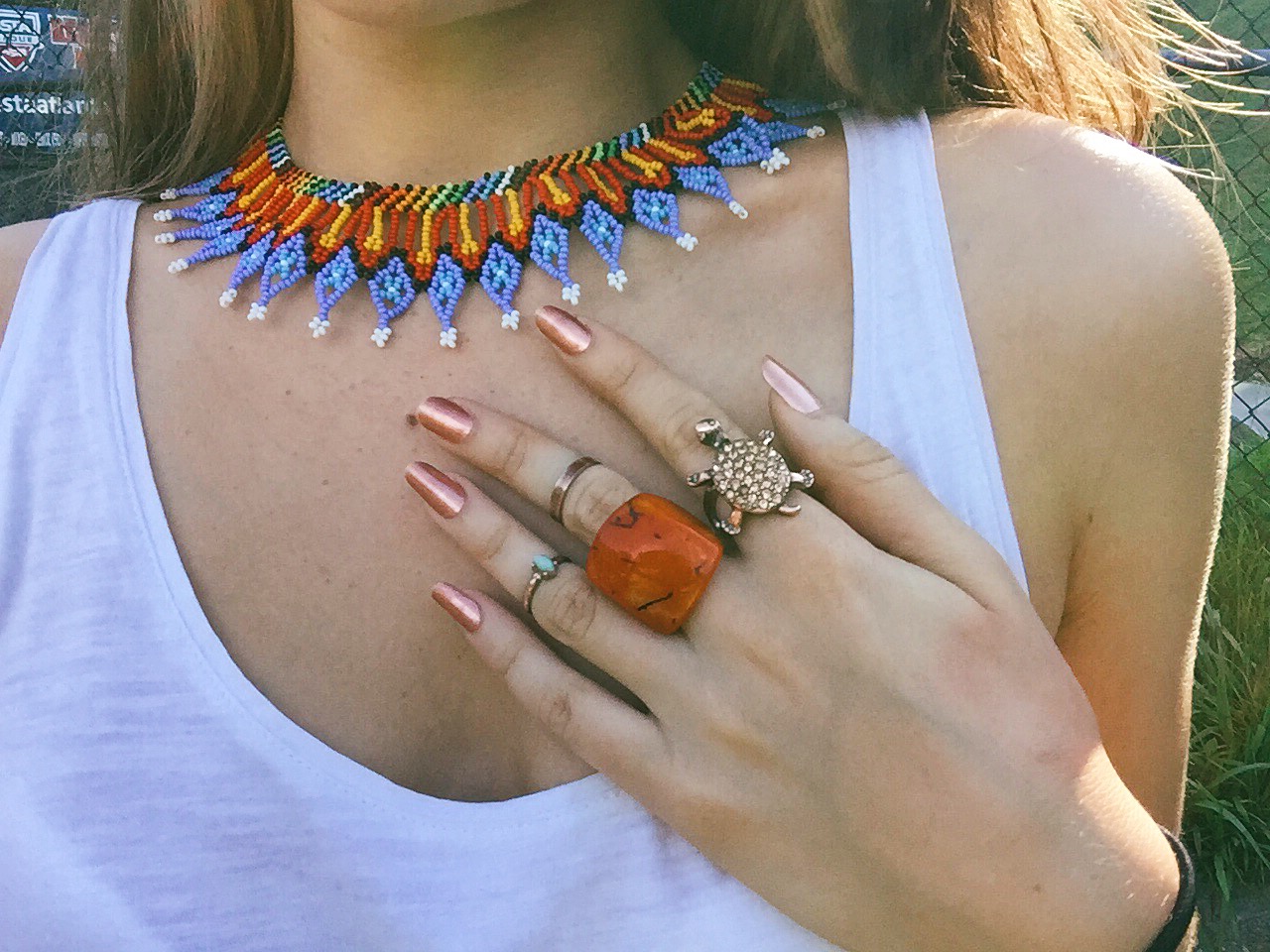 My beaded necklace featuring Colombian rings. Click to expand.