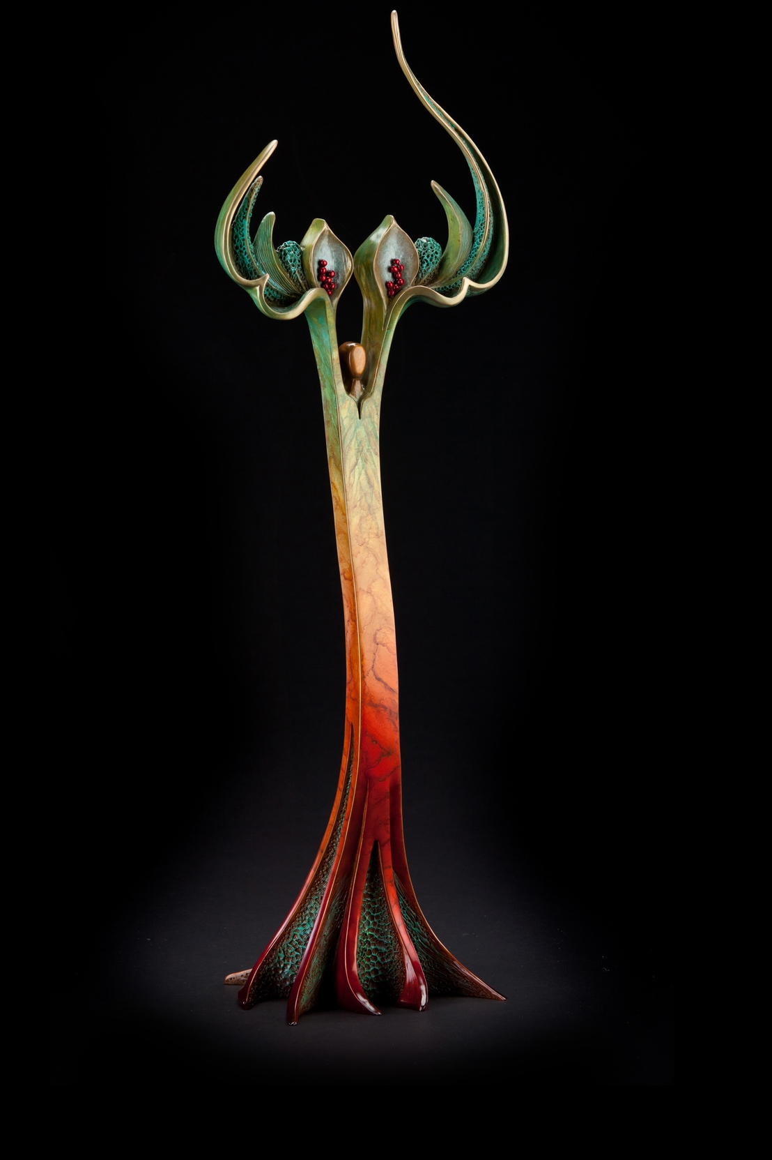 Celebrate Life , Bronze, 31” H x 10.25” W x 8.5” D, Edition of 35: This God/Goddess of abundance, growth, transformation, and birth honors us for celebrating life and joyfully spreading seeds of creativity, curiosity, and inspiration wherever we go.