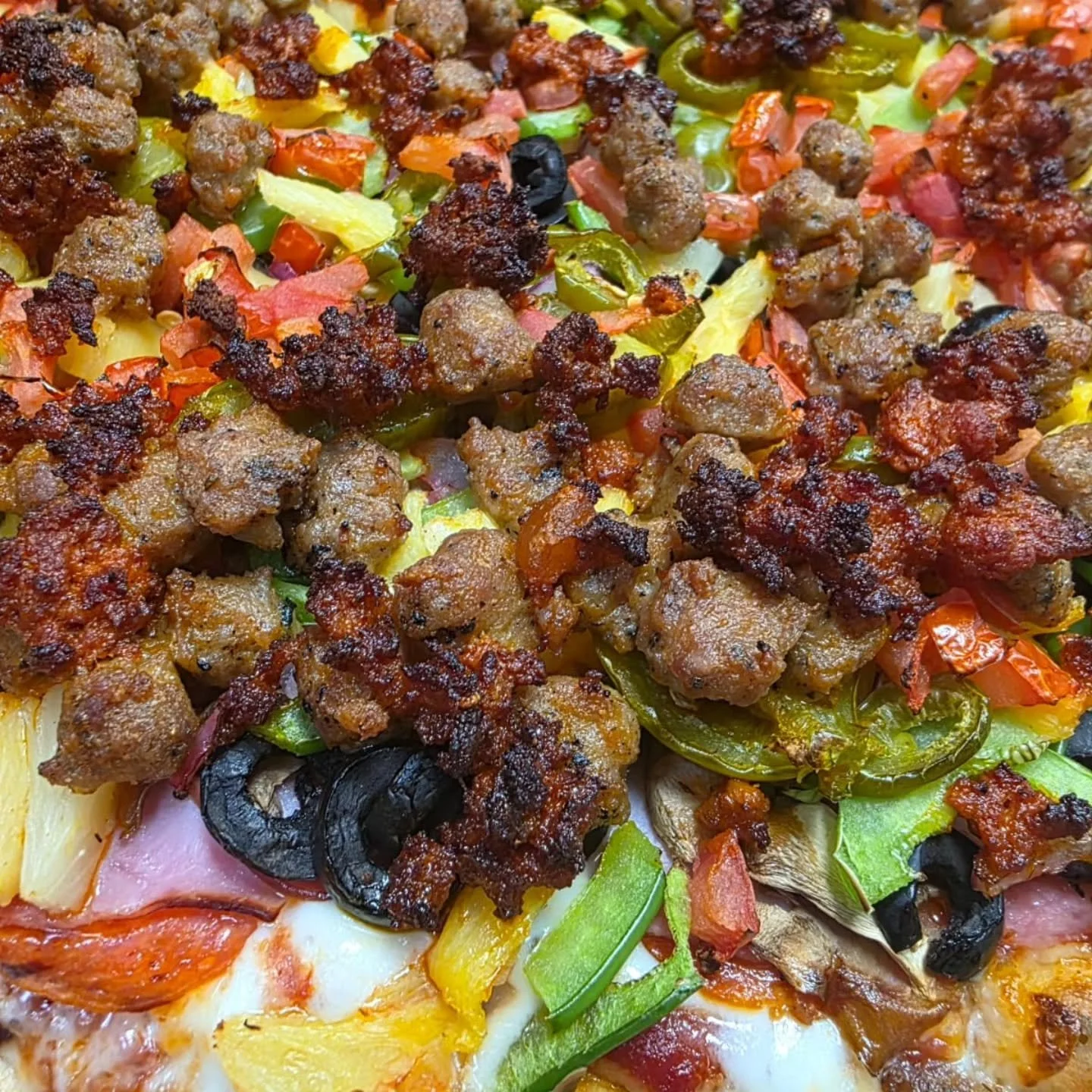 Toppings on topping on toppings... Just the way we want it.
