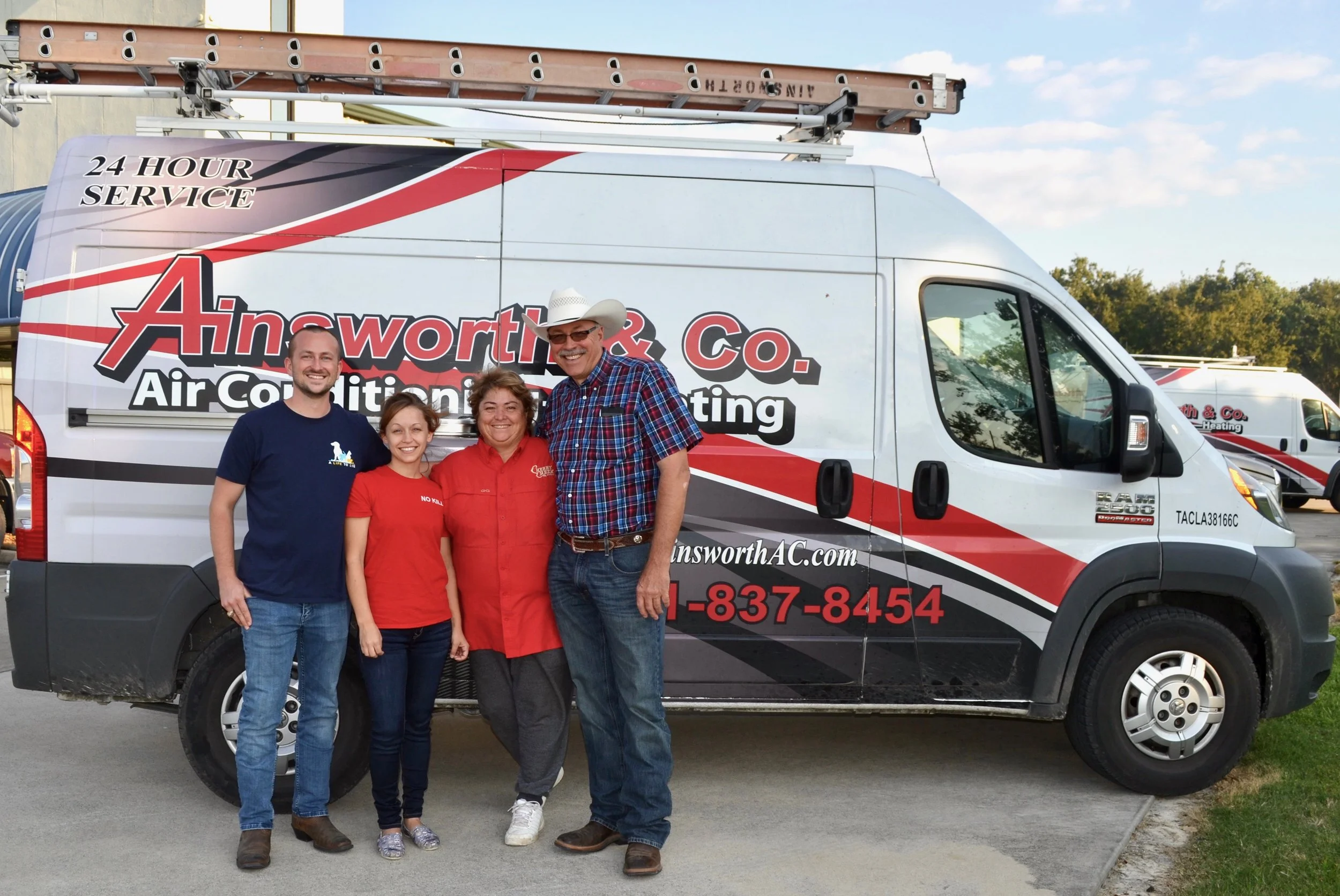 Robin and Junior Forrest (right), owners of Ainsworth and Company Air Conditioning and Heating, recently donated a refrigerator to A Life to Live for storing important supplies. Joining the Forrests are Jay Garrett, founder and executive director, and Magan Gonzales, co-founder and program director, of A Life to Live. Learn more about the organization at www.adopttosave.org.